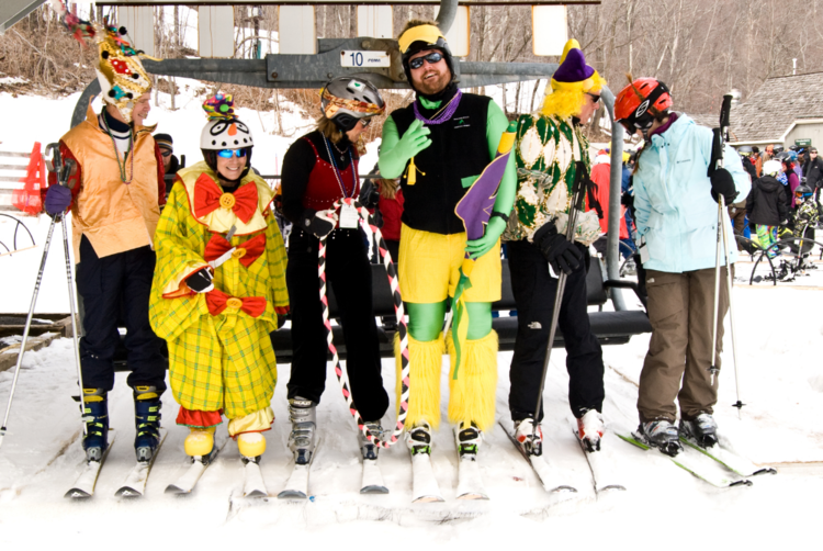 Dress on the slopes at the Wintergreen Adaptive Sports annual Mardi Gras event is different. Held always on the first Saturday in March near the end of our snow sports season, the day begins as we launch our version of a second line parade on skis and snowboards at 11am. Traditional Mardi Gras costumes are featured alongside those designed to reflect the year's theme. Following the parade is the traditional Mardi Gras gumbo lunch served at the WAS Hut. Chicken and Sausage Gumbo, Seafood Gumbo, and at least one vegetarian option are served with French Bread and plenty of Cajun and Zydeco music.