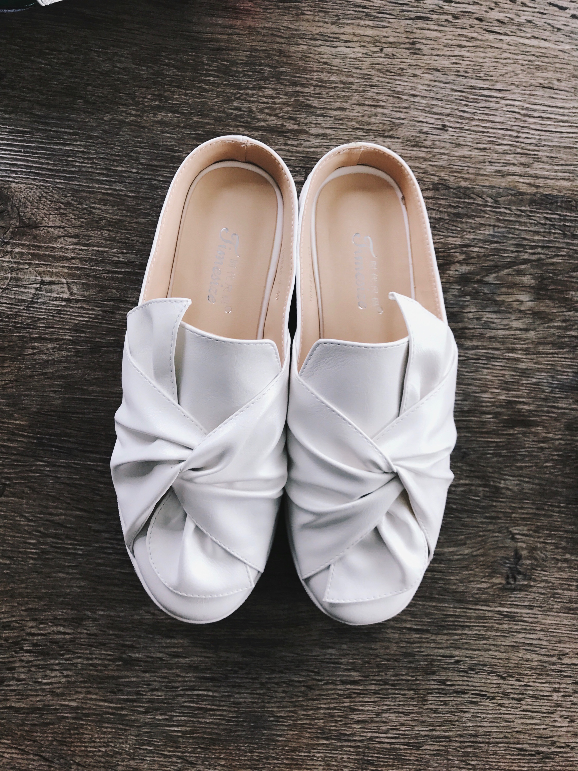 These White Faux Leather Round Toe Slippers ($32) are a bit unique as they're not a direct replica but rather a rendition of Ports 1961 Knotted Sneakers ($595). They are incredibly comfy with a bit of platform, and definitely my most adventurous pair of the set. I'm excited to match these with an all white outfit, featuring white denim, a white and black striped blouse, and geometric gold hoops. 
