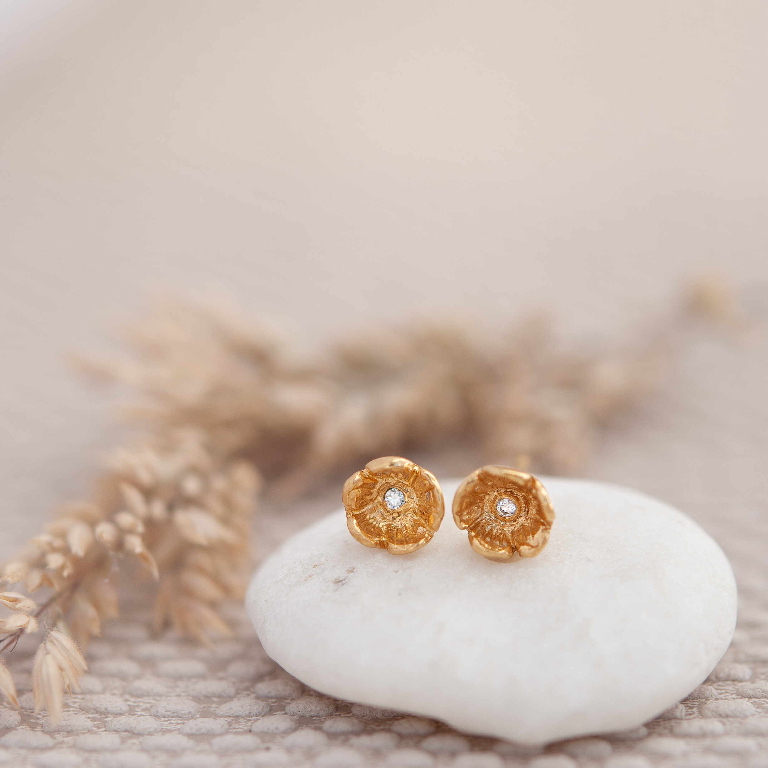 Gold diamond flower earrings