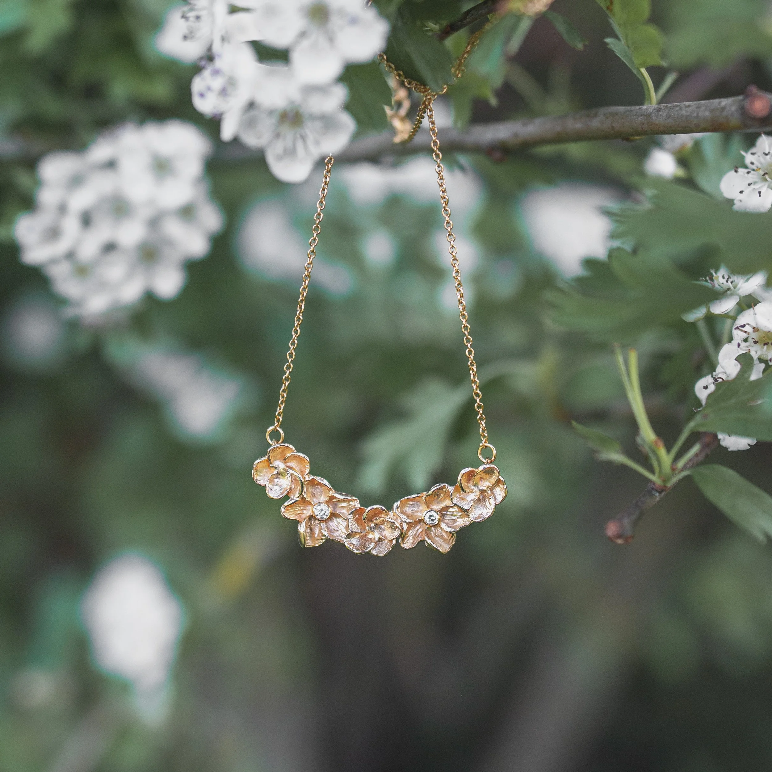 Repurposed gold hawthorn blossom inspired recycled diamond necklace
