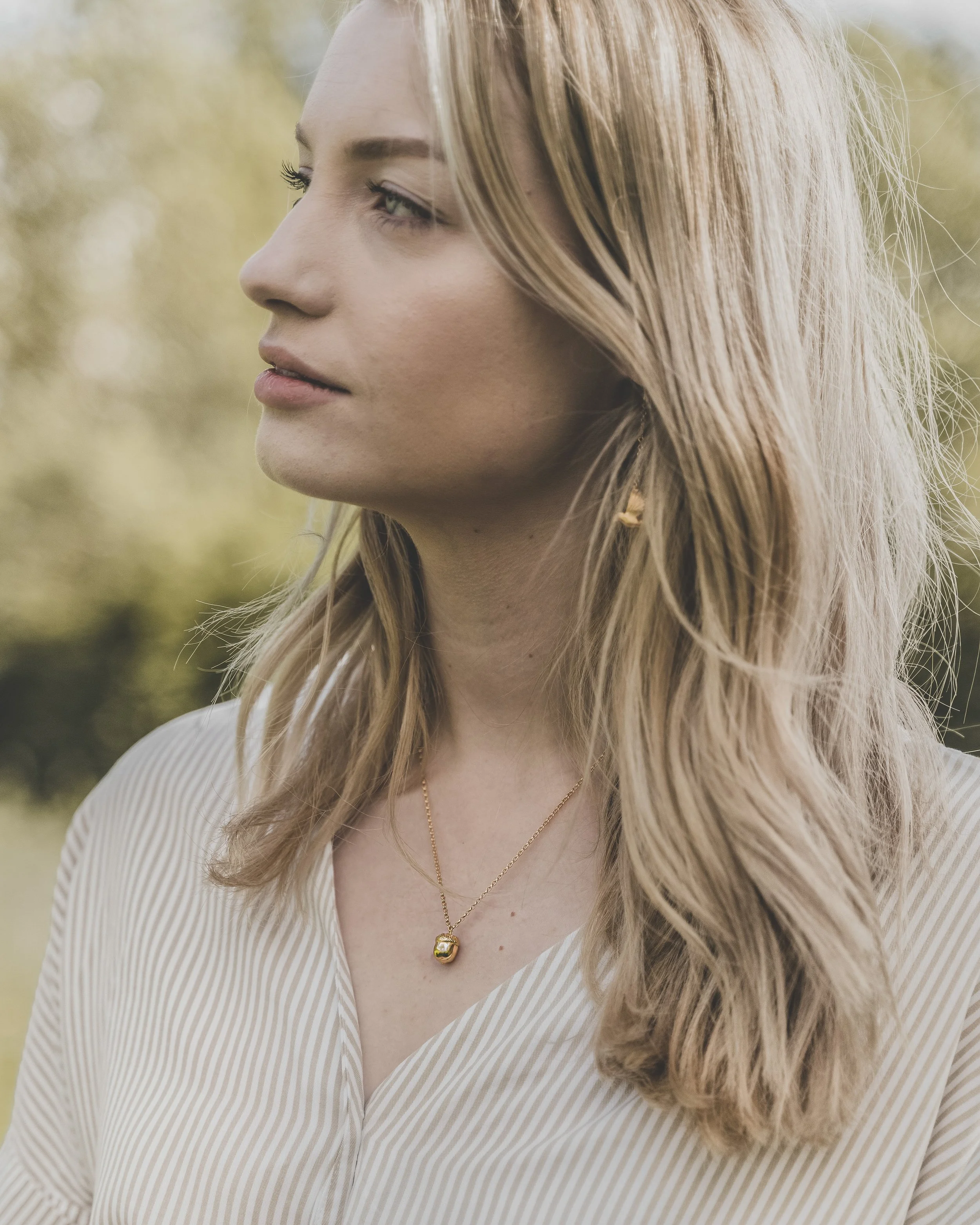 Repurposed gold nature inspired acorn necklace