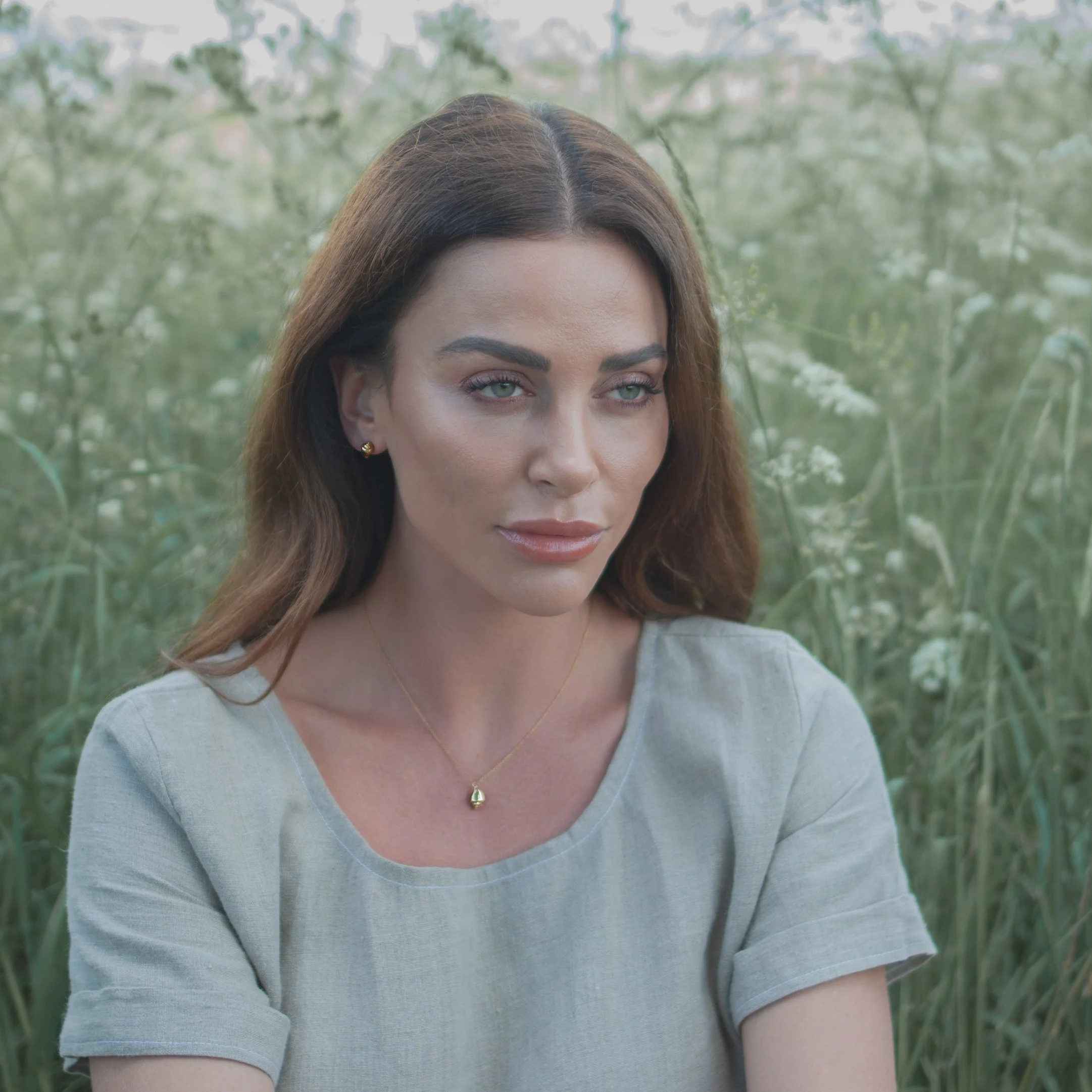 gold whelk necklace set square.JPG