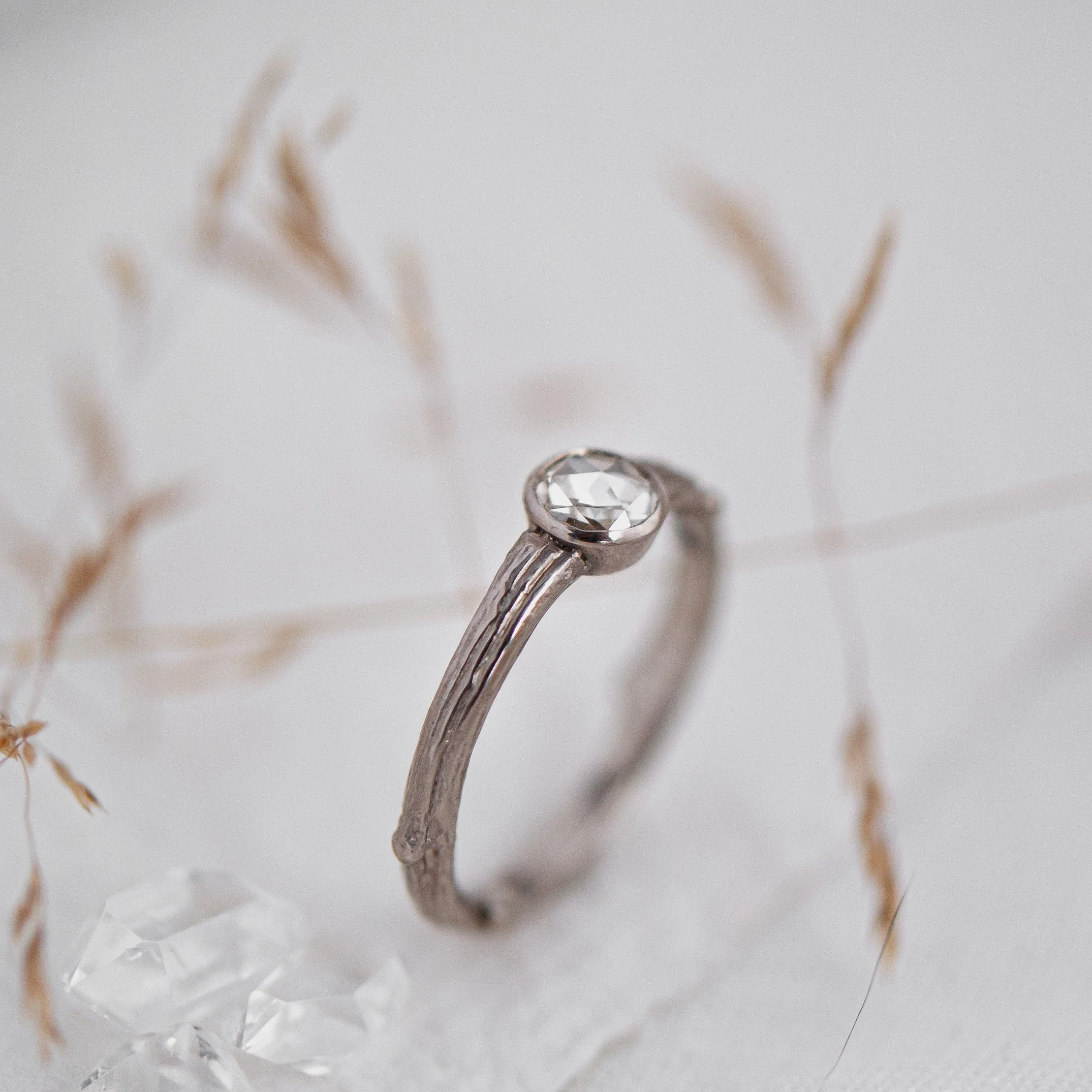 Ethical recycled white gold twig diamond ring