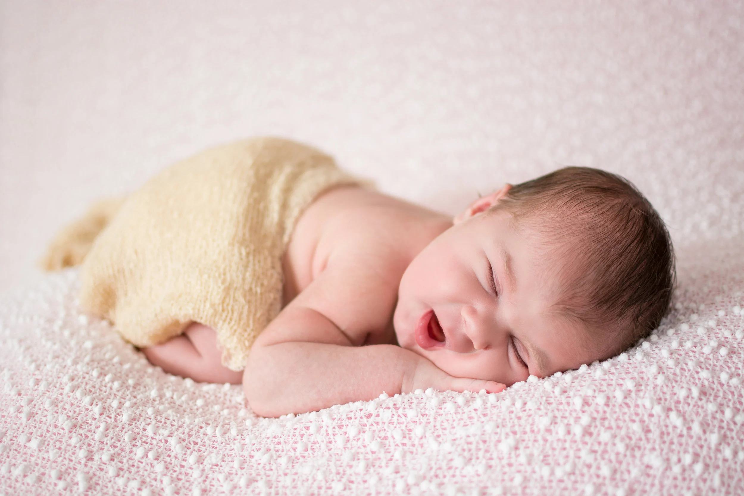 Smiling baby girl newborn photo