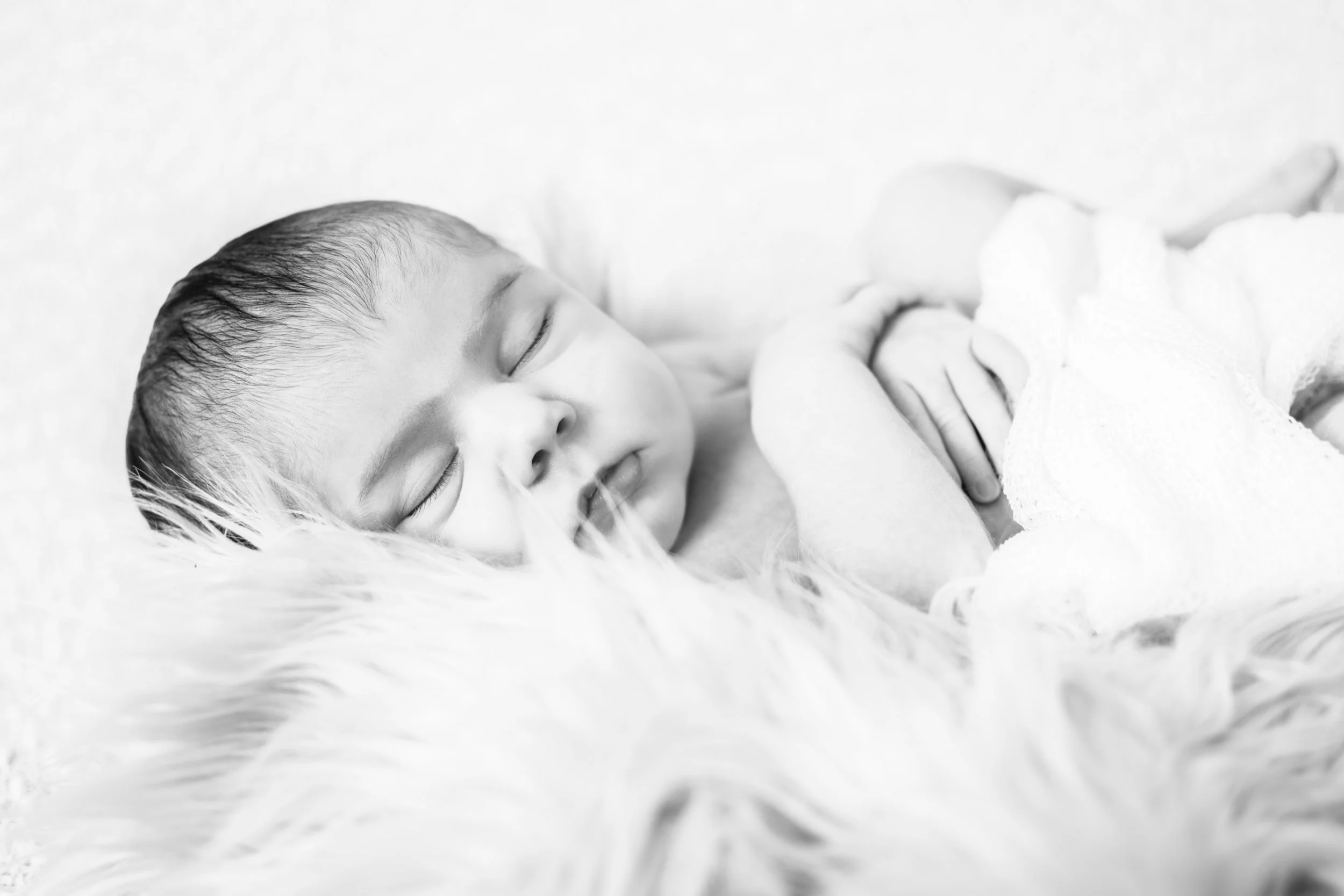 Black and white photo of newborn girl from Thunder Bay
