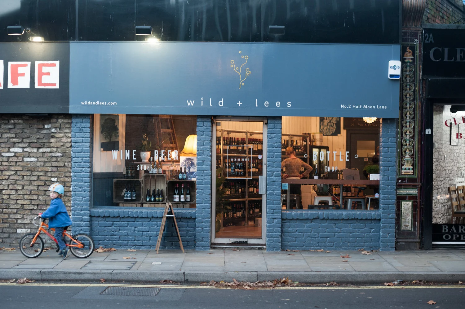 WE ARE A SHOP, A TASTING ROOM, AND YOU CAN ALSO STAY AND HAVE A DRINK AT OUR COSY WINDOW COUNTER WHILE WATCHING SE24 DO IT'S THING.
