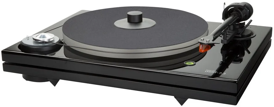 THE MUSIC HALL MMF-7.3 TURNTABLE IS A 2-SPEED BELT DRIVEN AUDIOPHILE TURNTABLE EMPLOYING THE UNIQUE DUAL-PLINTH CONSTRUCTION ORIGINATED BY MUSIC HALL. SORBOTHANE HEMISPHERES SEPARATE THE TWO PLATFORMS AND PROVIDE ADDITIONAL SUSPENSION AND VIBRATION DAMPING. THE MMF-7.3 COMES IN A HIGH-GLOSS PIANO BLACK LACQUER FINISH AND IS AVAILABLE WITH OR WITHOUT THE ORTOFON 2M BRONZE CARTRIDGE.