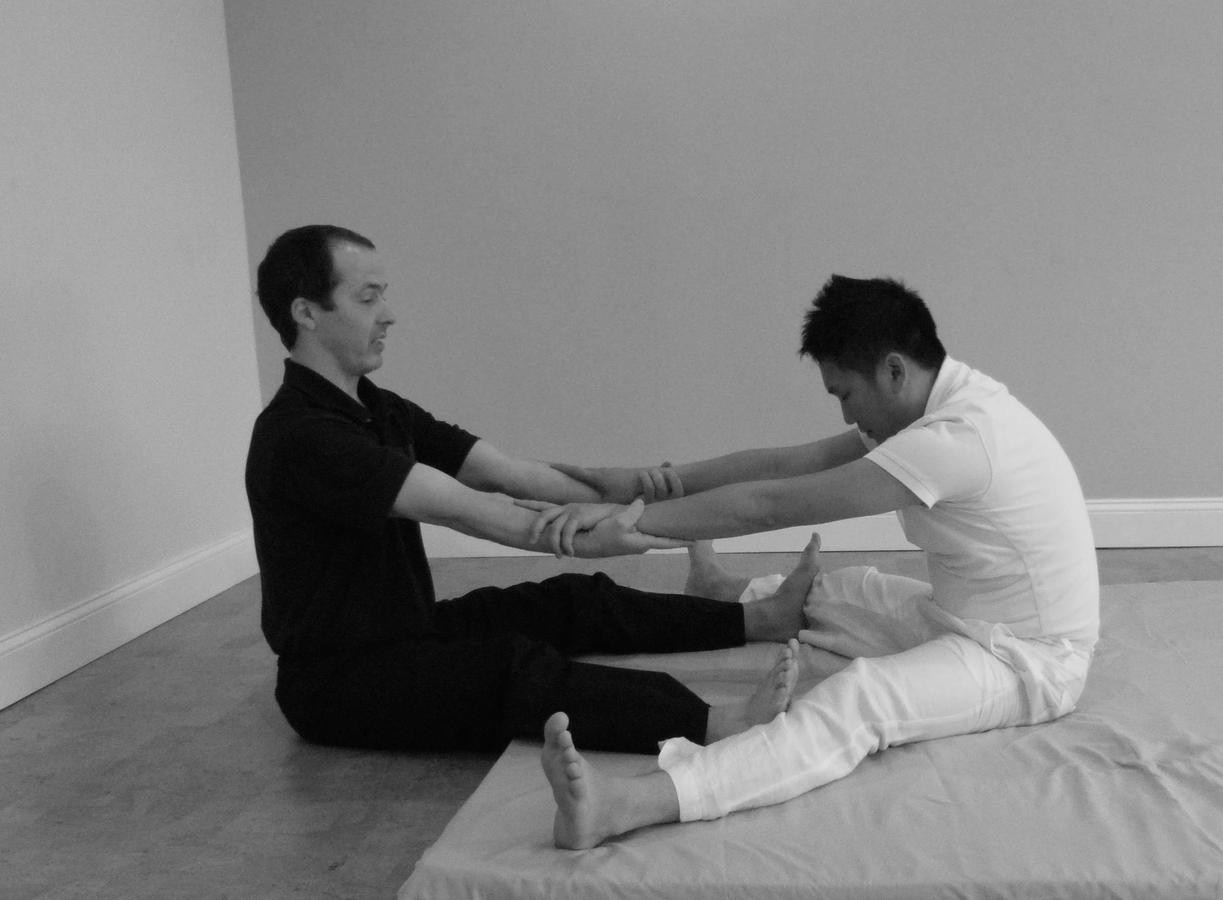 Thai Massage Wide Leg Stretch.jpg