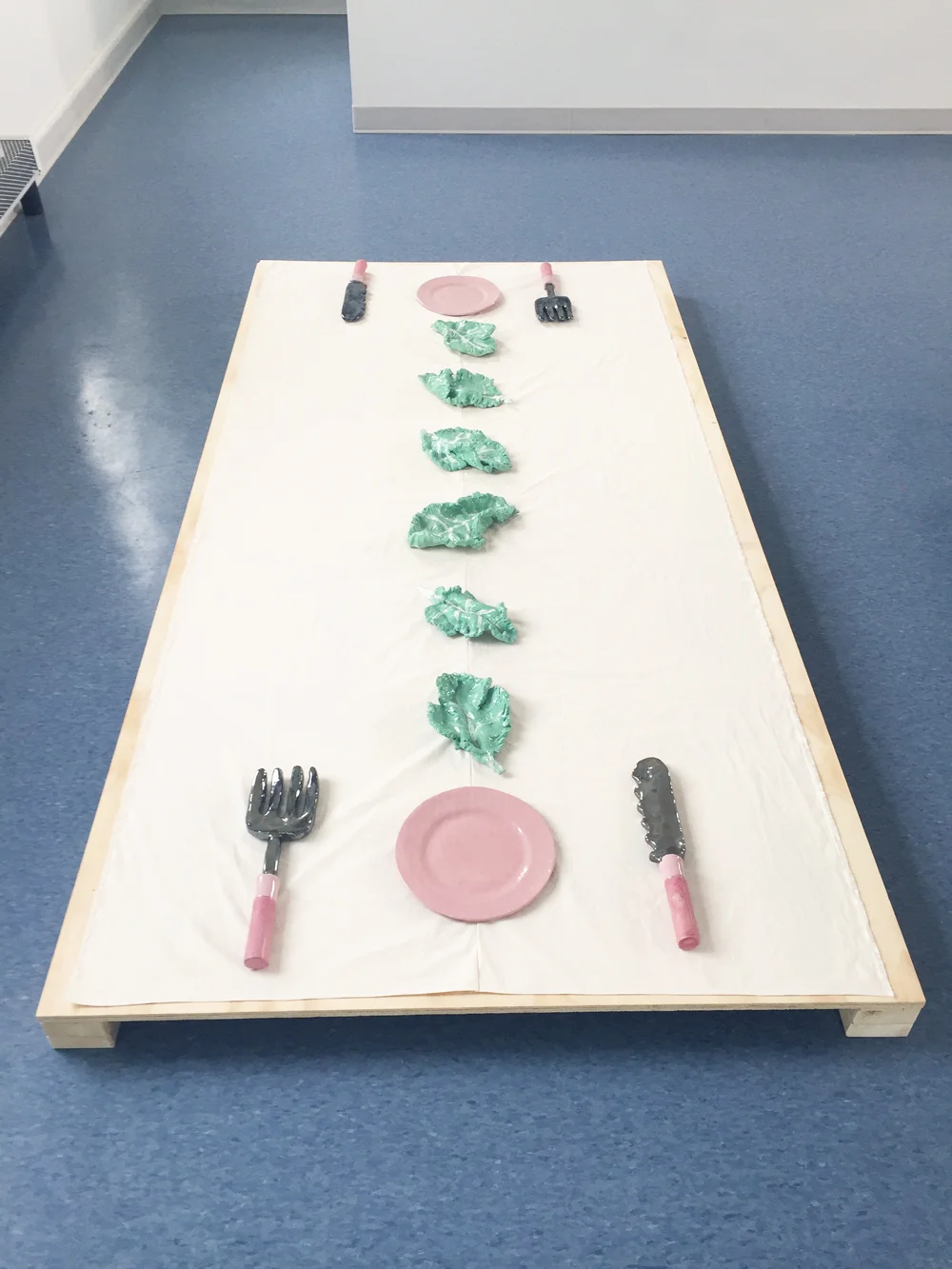 Place Setting , 2017, Ceramic, muslin, thread, wood, 6" X 48" X 96"