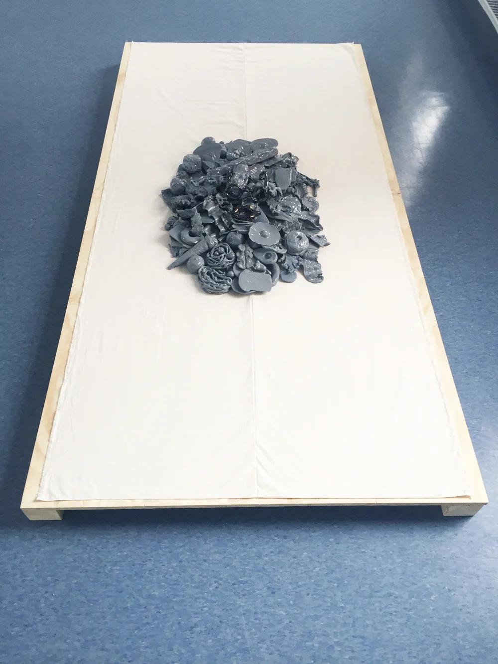 All Bodies Eat , 2017, Ceramic, muslin, thread, wood, 6" X 48" X 96"