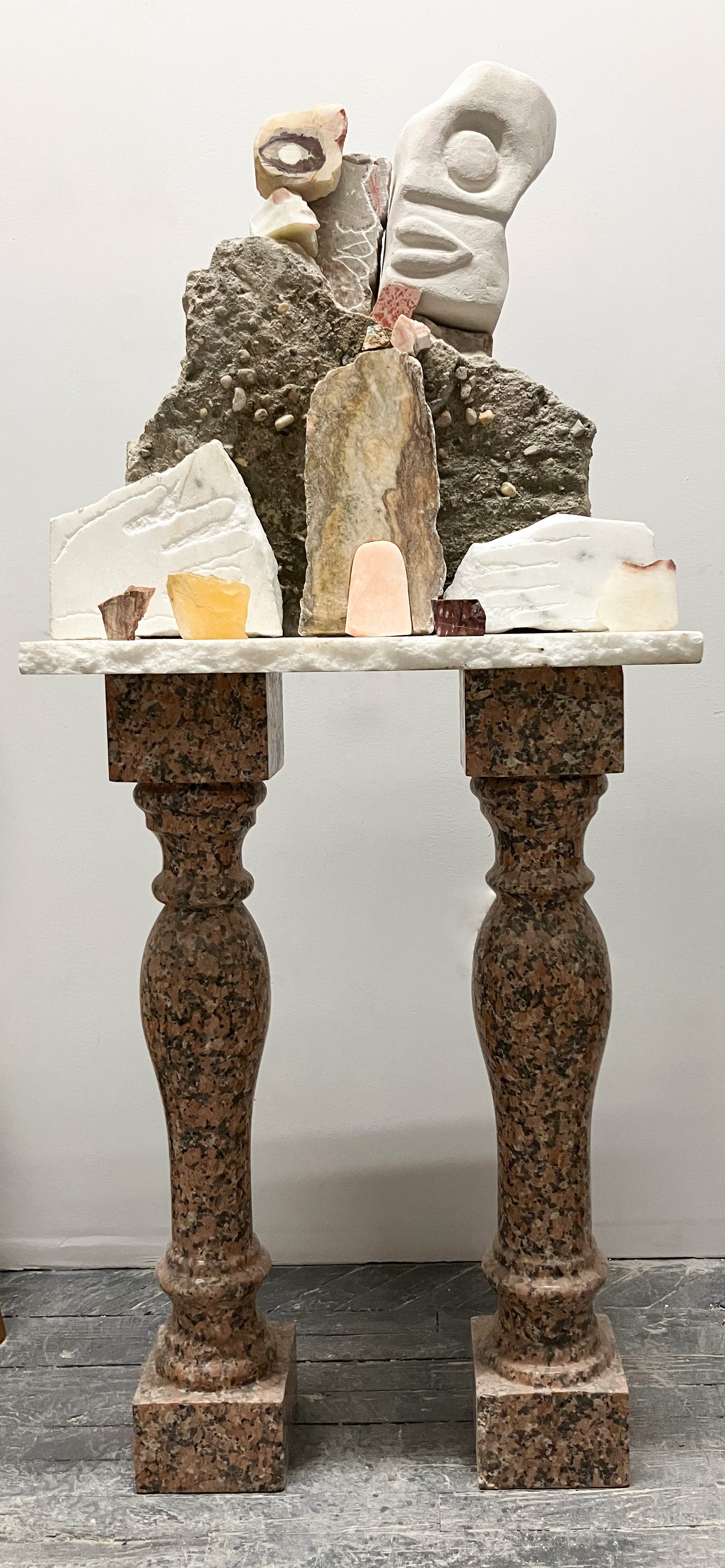 Figure/s III, 2023, Limestone, soapstone, marble, pipe stone, onyx, calcite, 57” X `4” X 24”