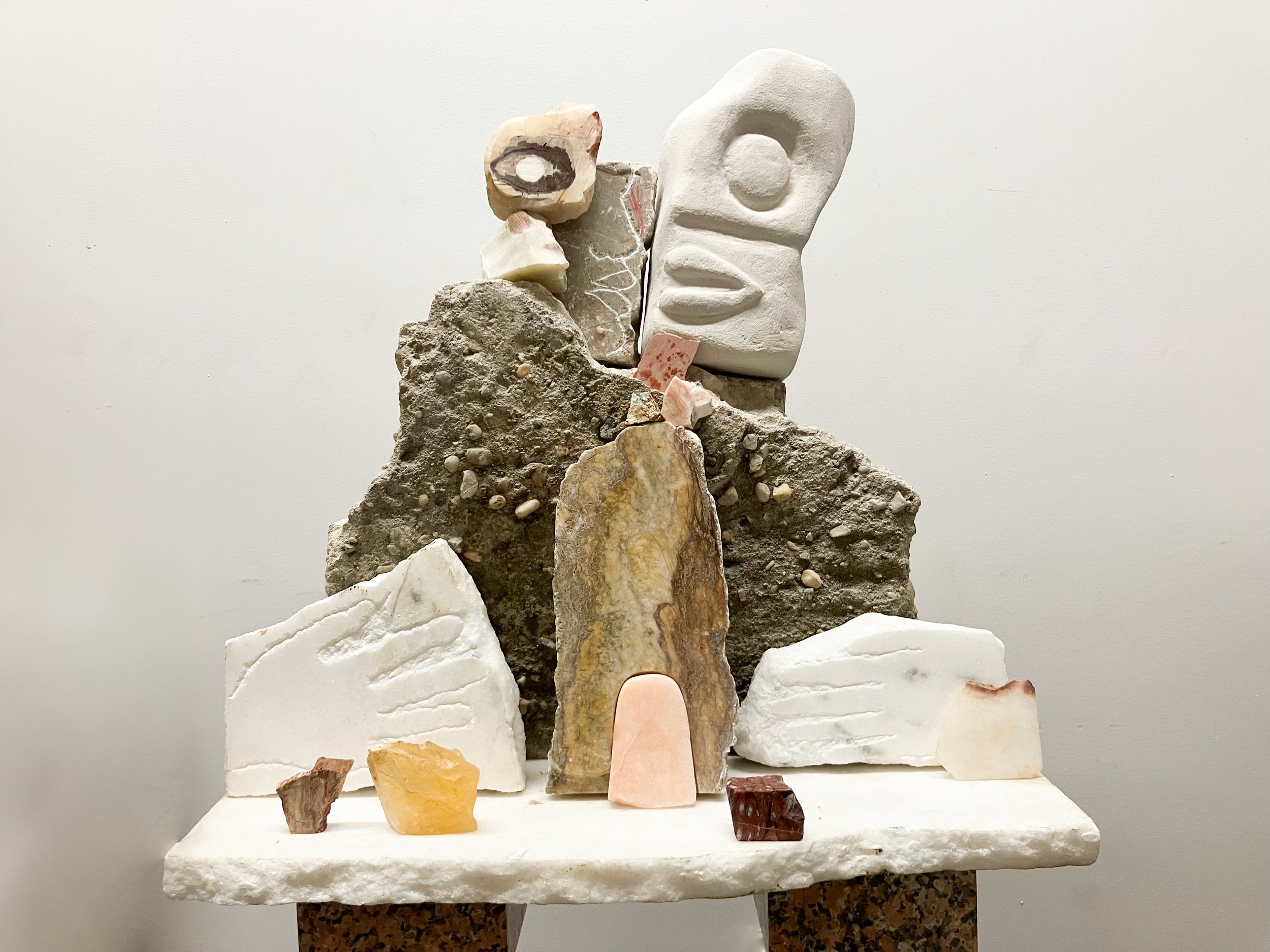 Figure/s III, 2023, Limestone, soapstone, marble, pipe stone, onyx, calcite, 57” X `4” X 24” (Detail)