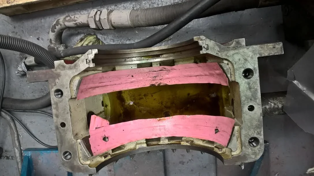 condition of refurbished bearing after a short period of operation along with damaged insulation - machine downtime as a result was 3 weeks