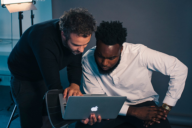 Director Richard Twyman discusses options with Abraham Popoola.