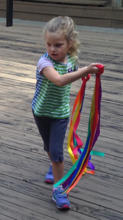The scarves also provided a colorful gross motor experience for our youngest campers.