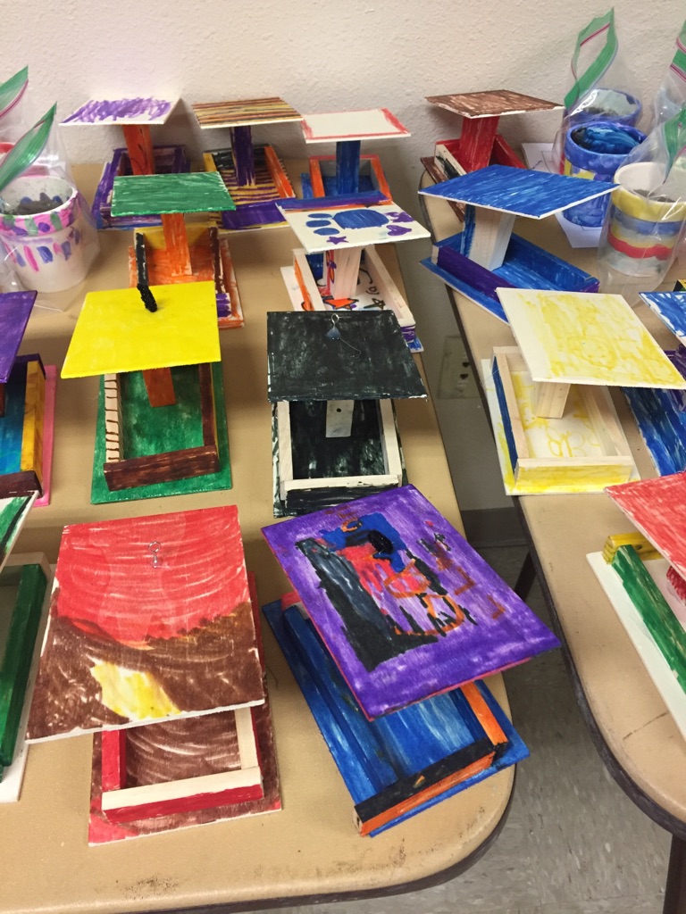Campers created birdhouses and decorated flower pots.