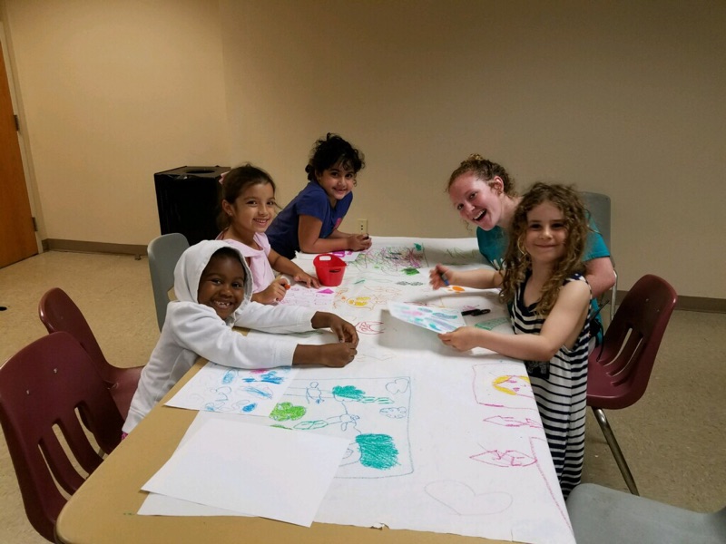 Can you spot a teacher in this group or is she camouflaged?