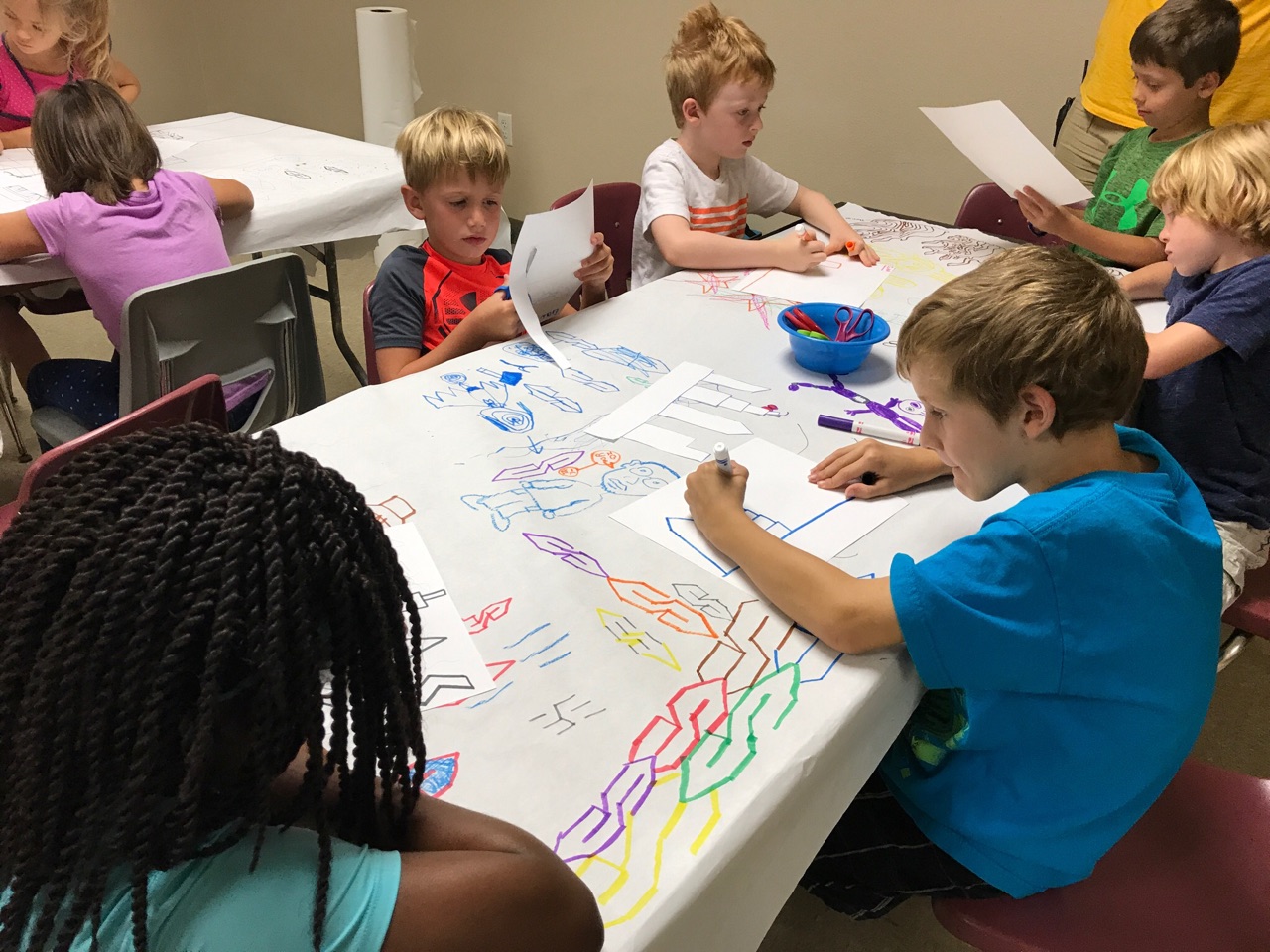 Designing the skylines and cutting them out was a very lengthy process. "In hindsight, I think we should have used stencils to speed up the process, but it was really cool to see their building ideas," reflected Colucci after the project was completed.