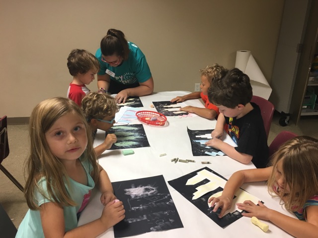 "Once we got to the last step, campers were pretty intrigued with the smudging of the chalk and the effect it had on our cityscapes," explained Colucci.