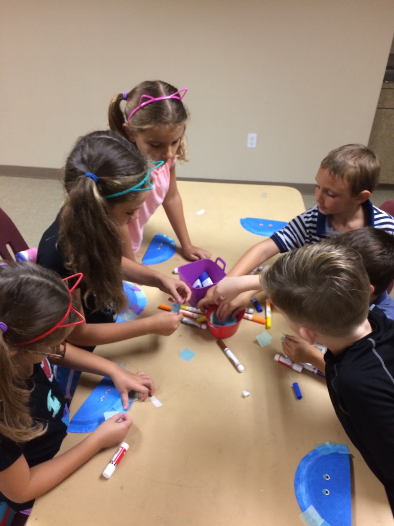 Campers enthusiastically choose the colors for their pattern jellyfish!