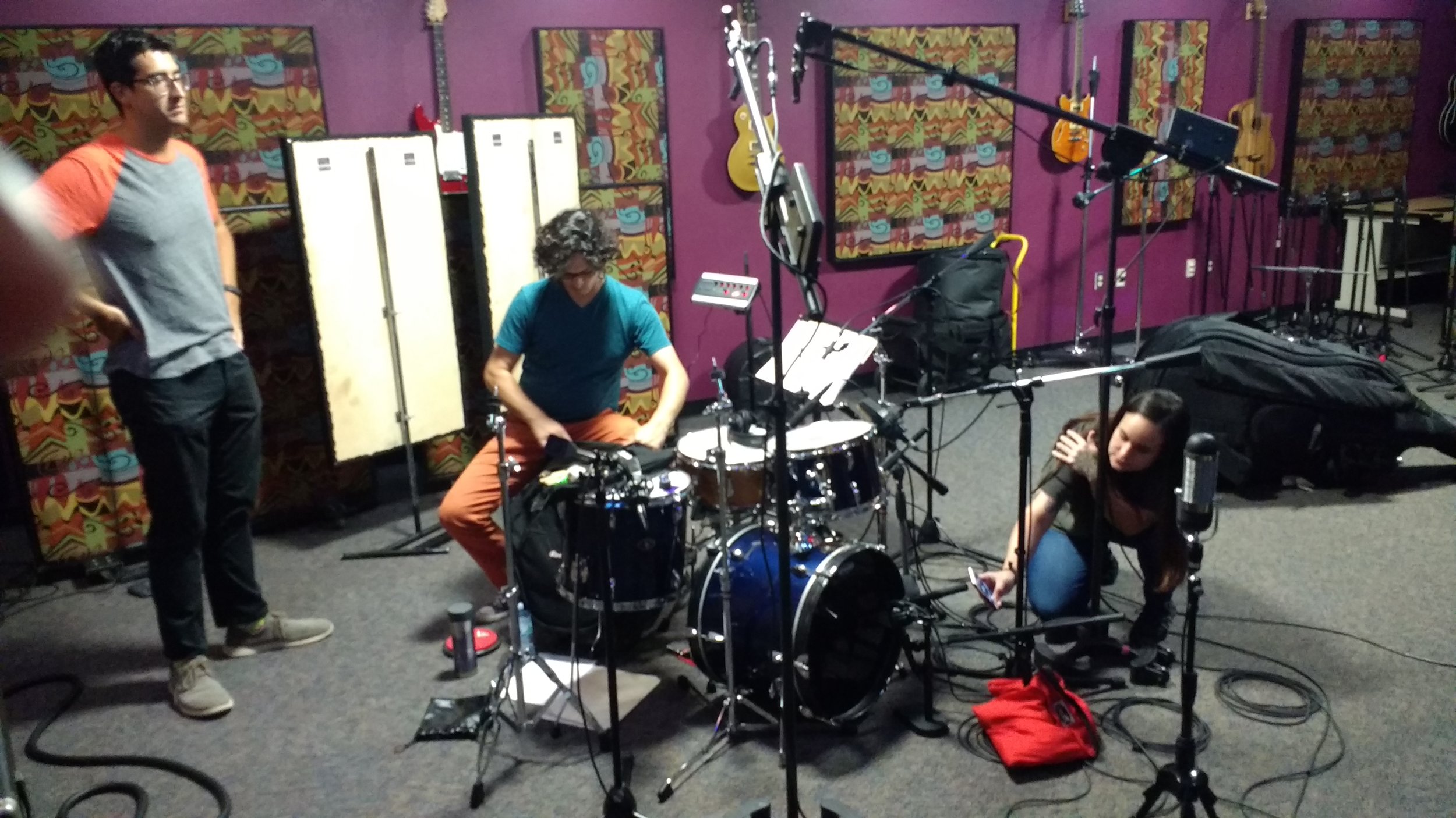 Alejandro, Mark and Melissa setting up for a session.