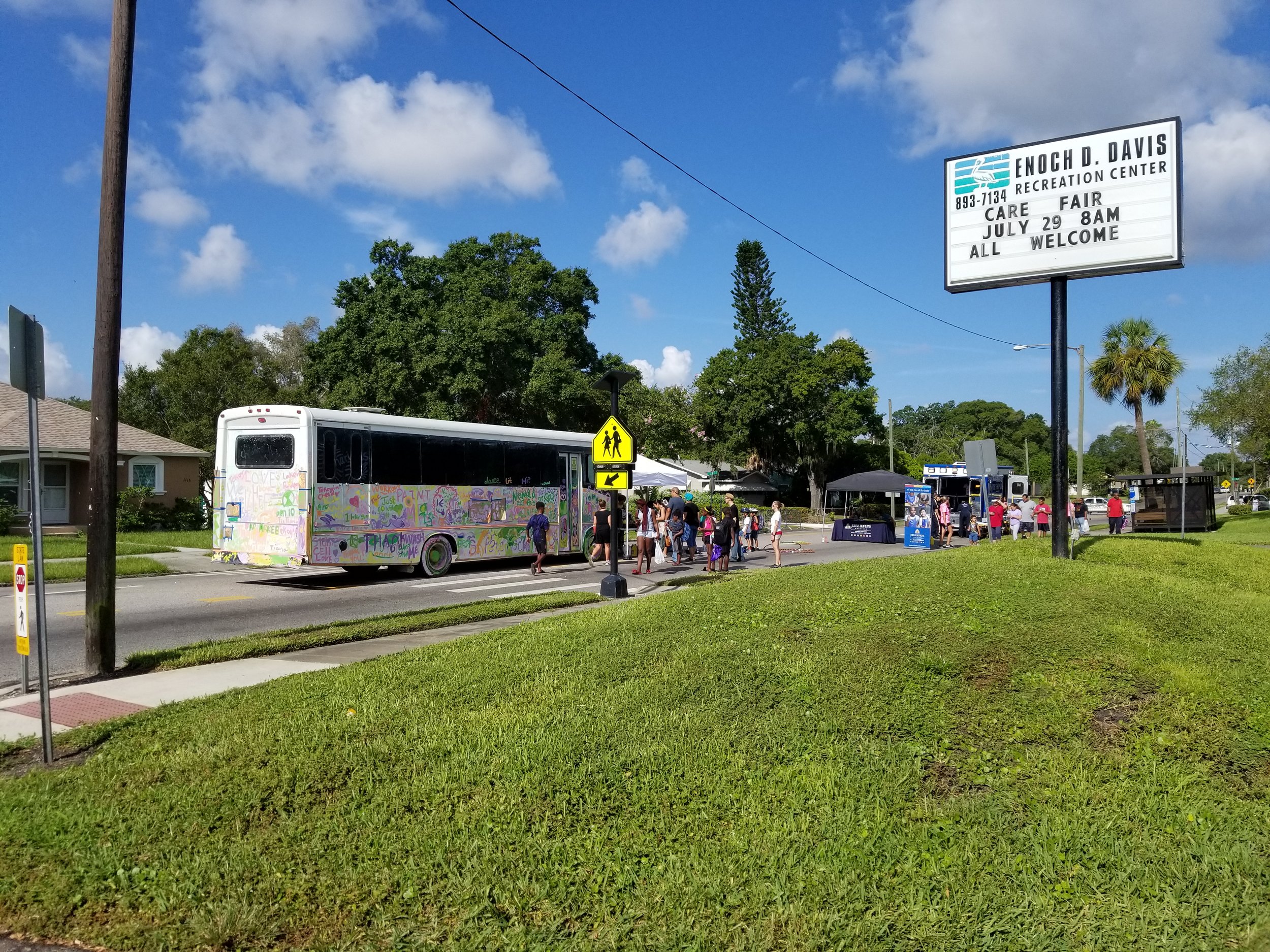 Visitors to the Junior League of St. Petersburg's annual Care Fair on July 29, 2017 painted the NOMAD Art Bus in the Great Explorations art area throughout the event.