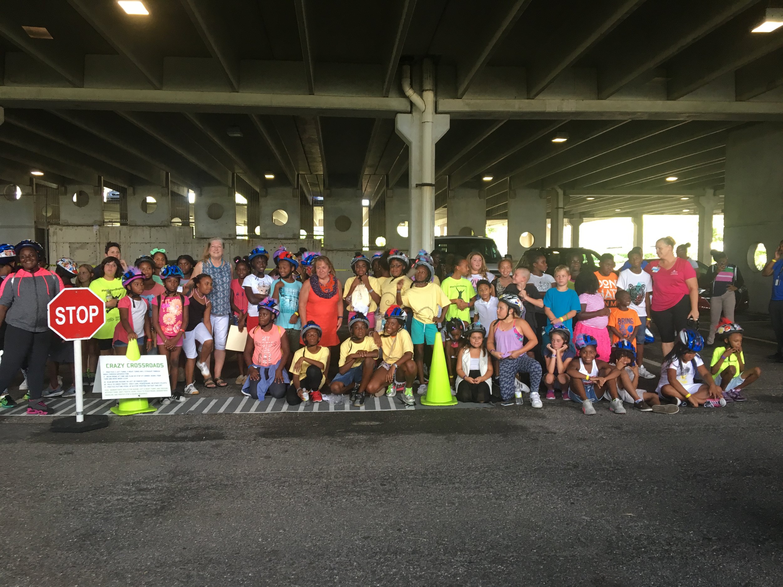 Pictured above: Bicycle Rodeo student participants with Lynn Bittner (center), City of St. Petersburg Leisure Services Recreation Centers Director and Vickie Brunner (left center) Dalí Museum Family Programs Coordinator.