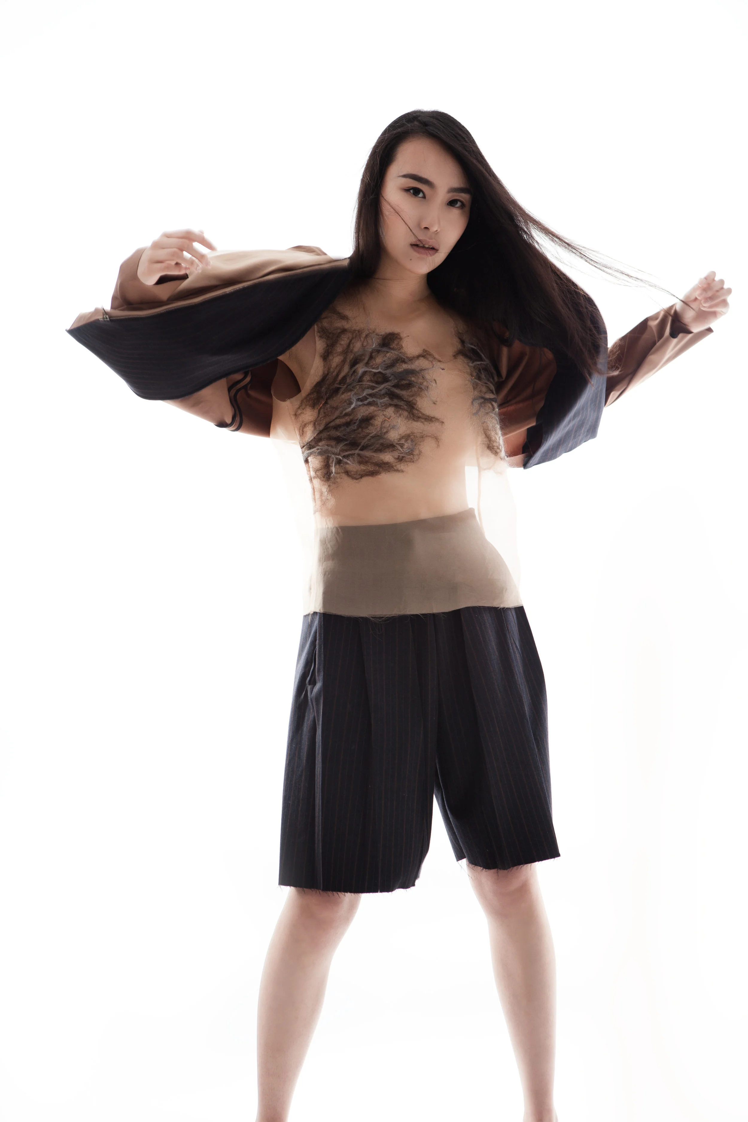 cotton lycra jacket with organza overlay and lined in pinstriped wool