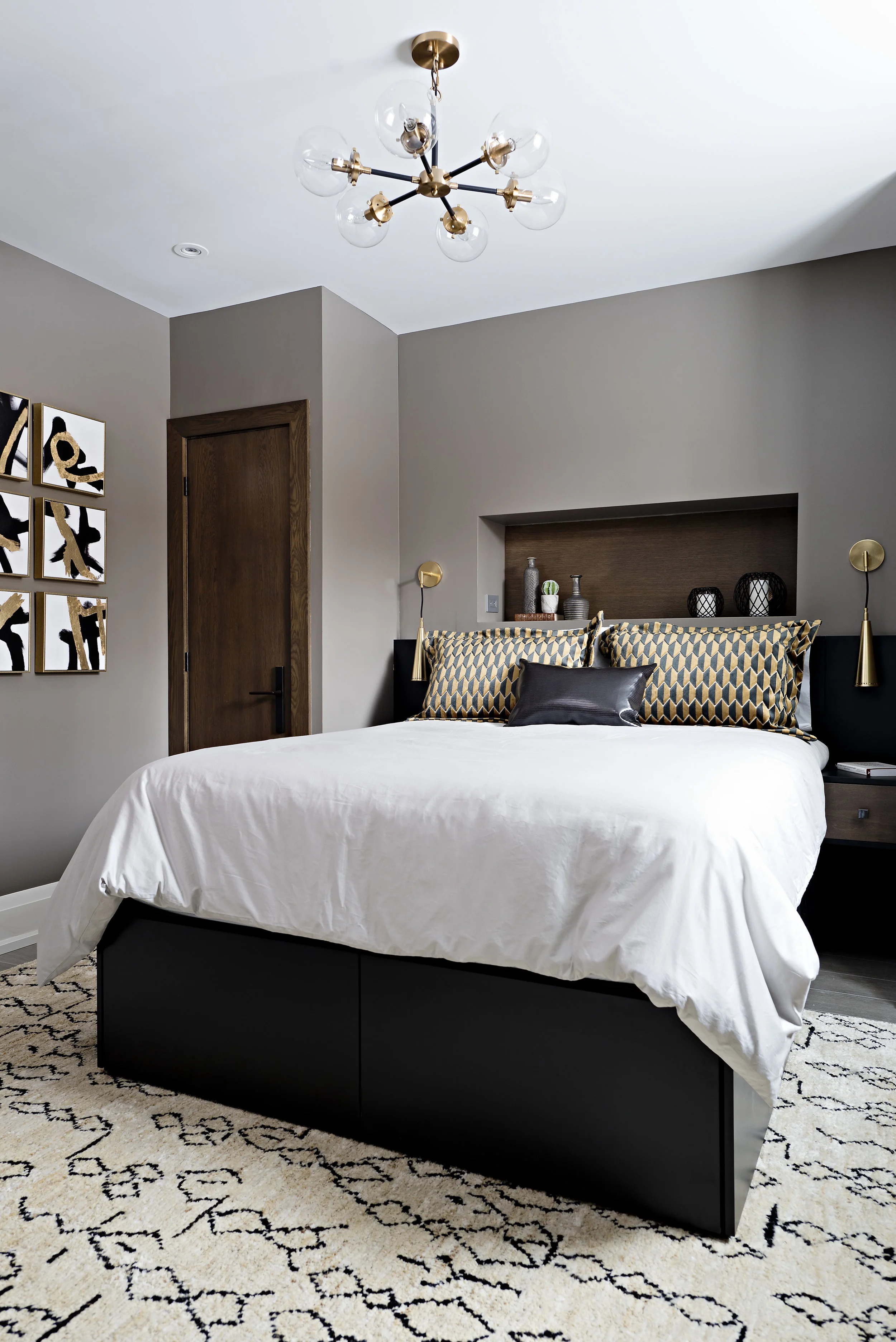 Interior Designer Pizzale Design Stylish Boys Bedroom Black and Gold Art and Pillows Custom Millwork.jpg