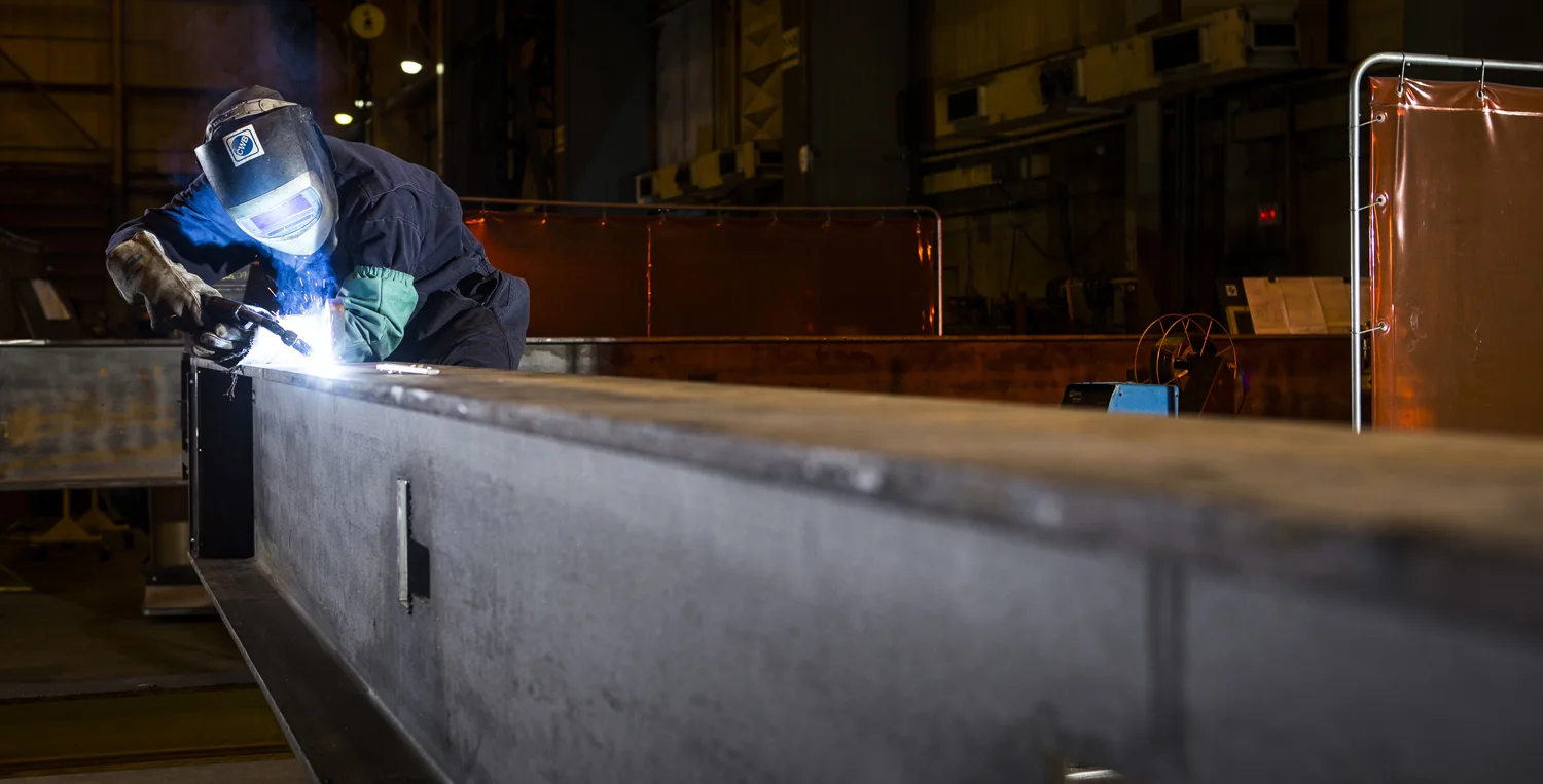 Welder photographed on location at Handling Specialty, Industrial Photography by Jon Evans