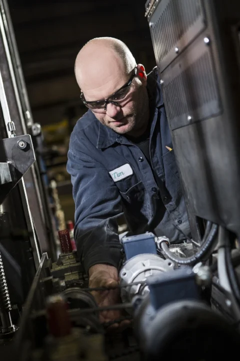 Factory worker photographed on location at Handling Specialty, Industrial Photography by Jon Evans