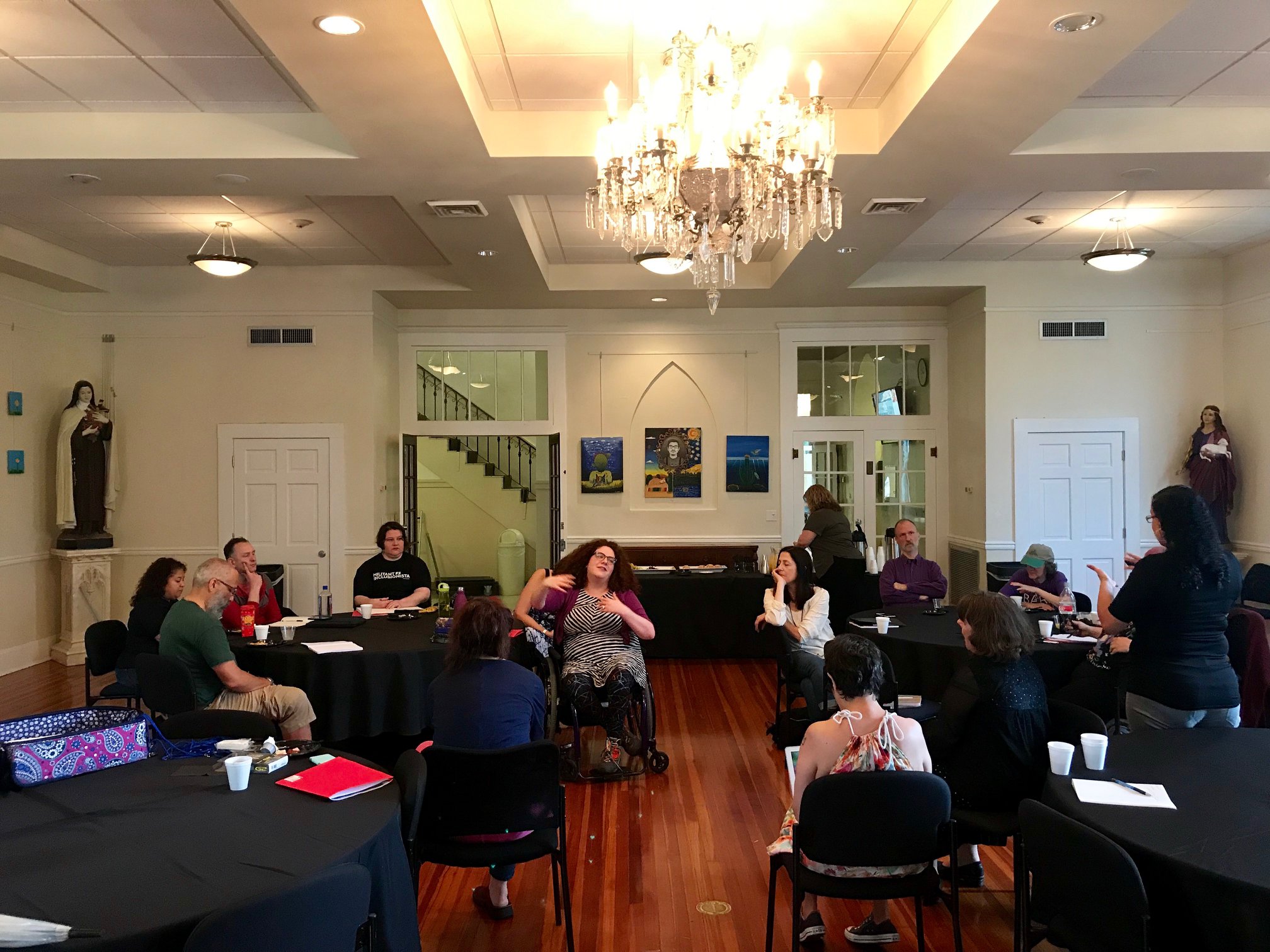                    2019 Conference participants in discussion at Our Lady of the Lake University in San Antonio, TX. 