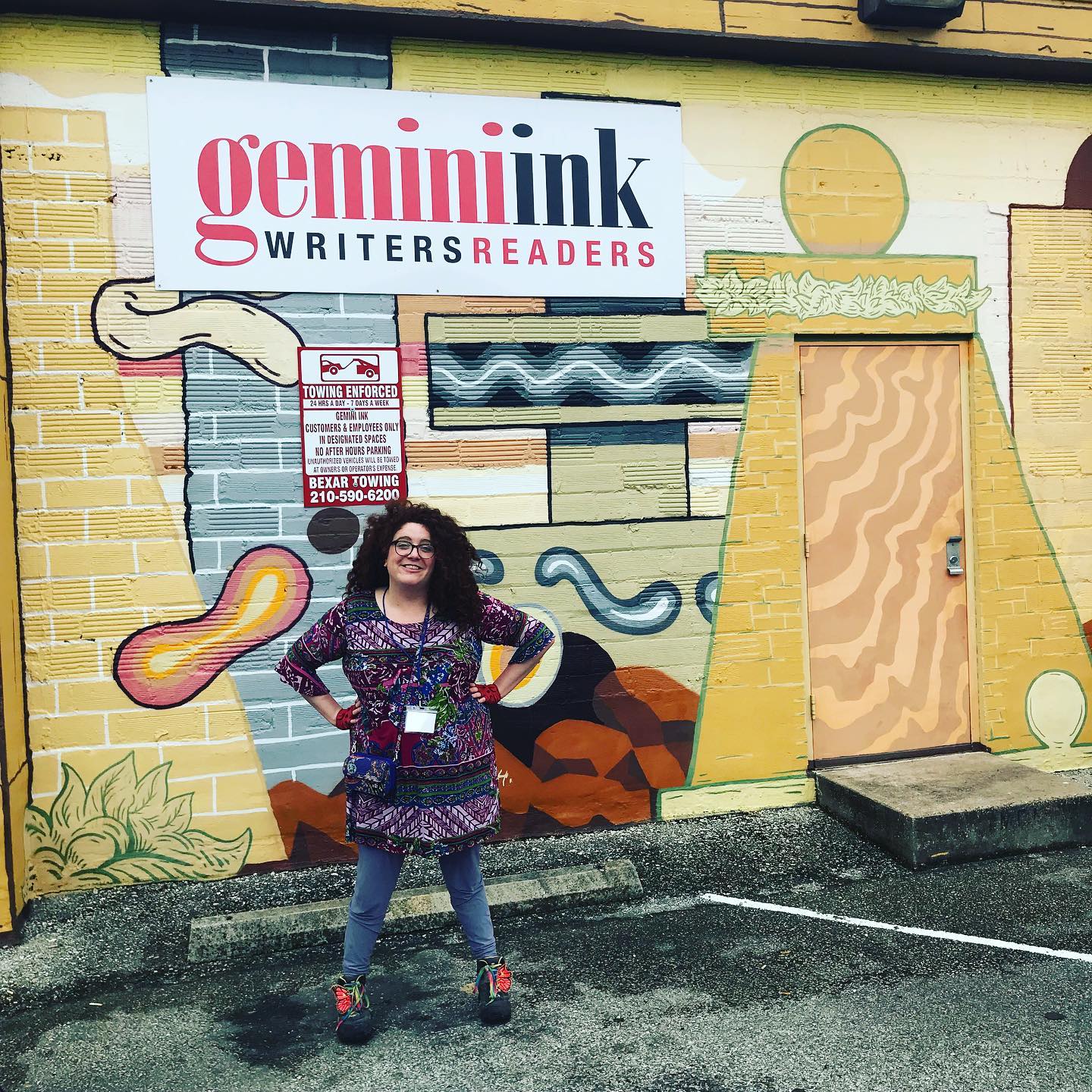                      2019 Conference participant poses outside of Gemini Ink in San Antonio, TX. 