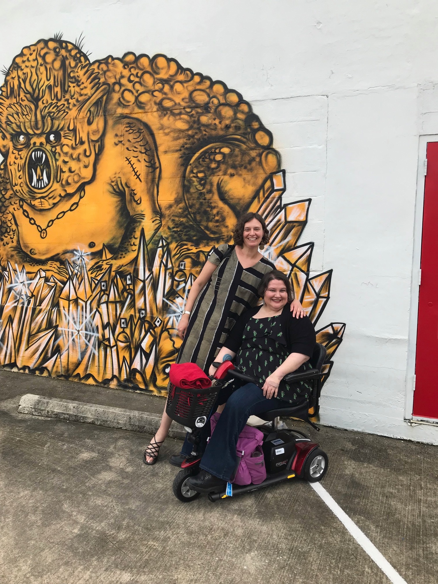                      2019 Conference participants pose outside of Gemini Ink in San Antonio, TX. 