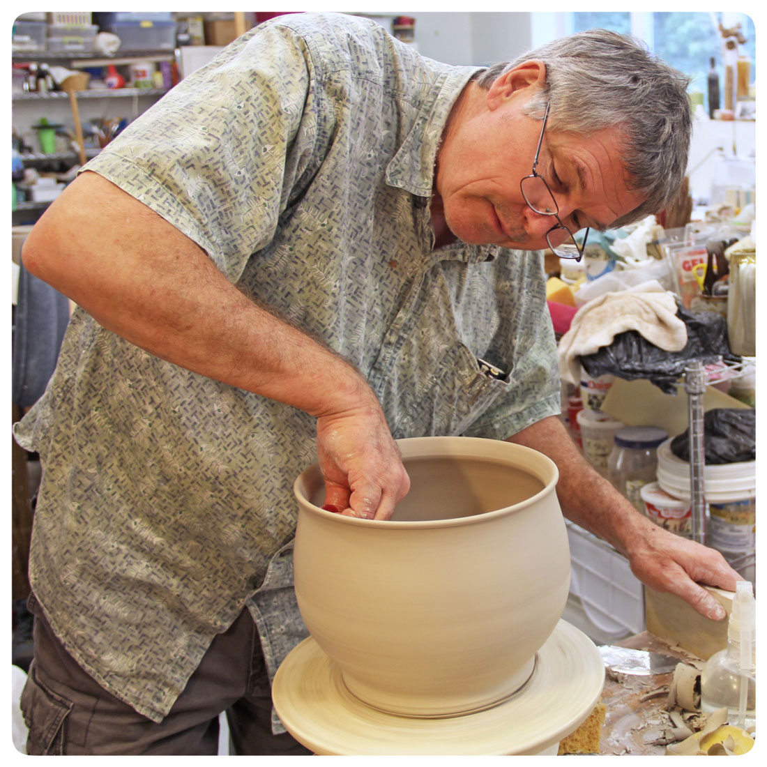 Copy of Bruce Gholson finishing a bowl at his wheel in our studio | Bulldog Pottery | Seagrove | North Carolina