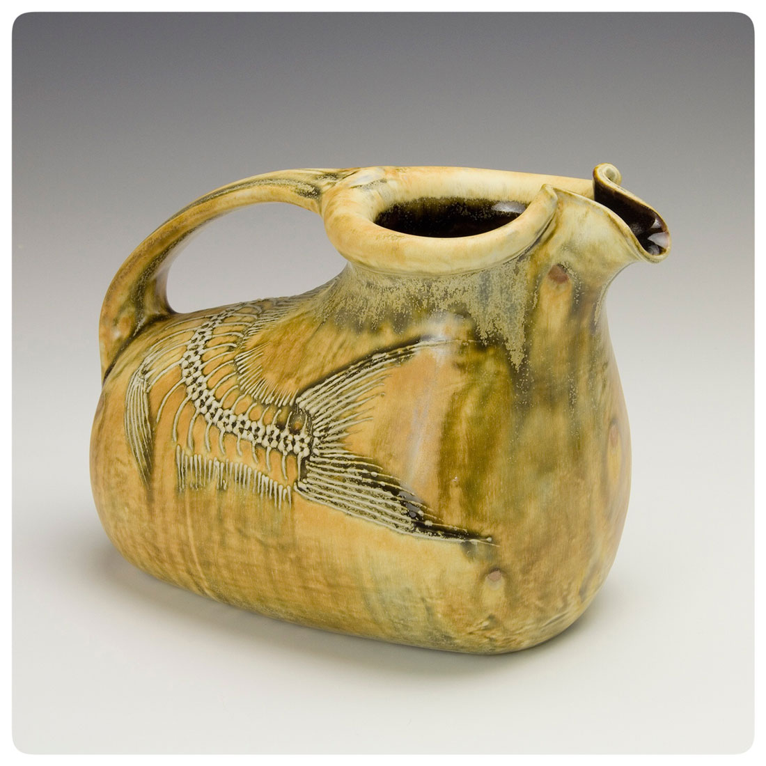 Barrel Pitcher with fossil fish made by Bruce Gholson.jpg