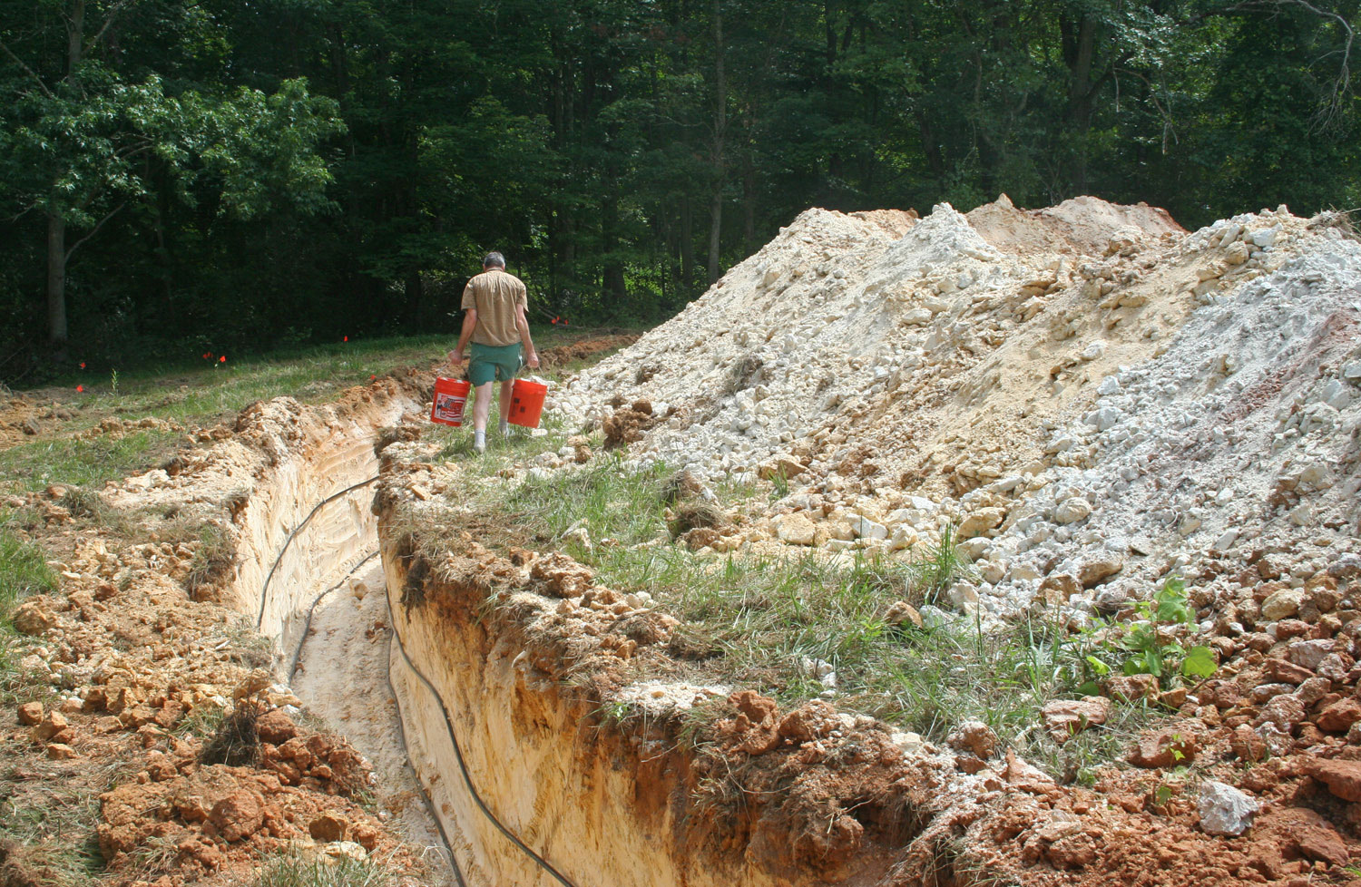 Bruce gathering local materials after we had our geothermal lines dug | Bruce Gholson | Bulldog Pottery | Seagrove | North Carolina