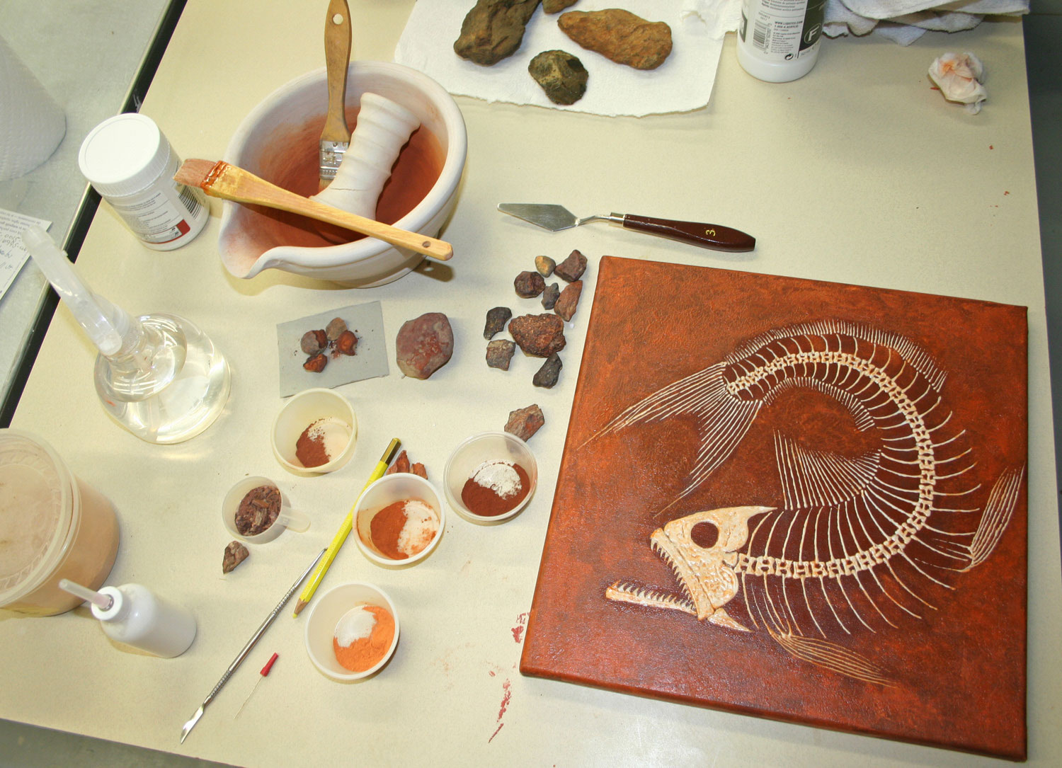 Completed fossil fish painting with local organic pigments by Bruce Gholson | Bulldog Pottery | Seagrove | North Carolina