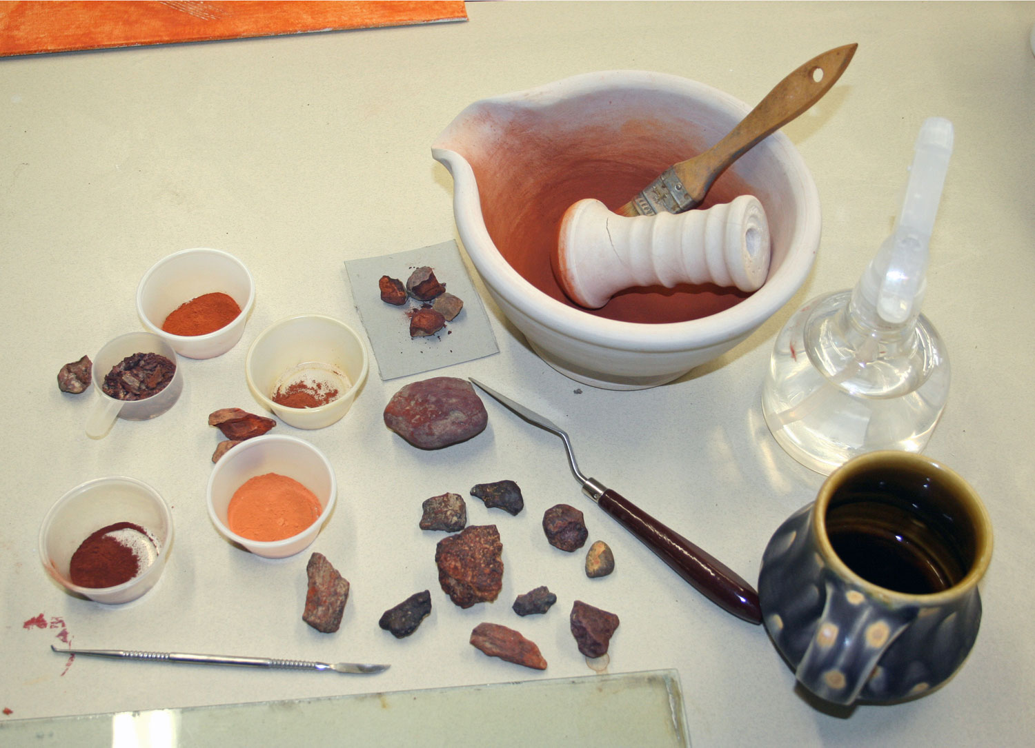 Grinding organic pigment for my fossil fish painting | Bruce Gholson | Bulldog Pottery | Seagrove | North Carolina