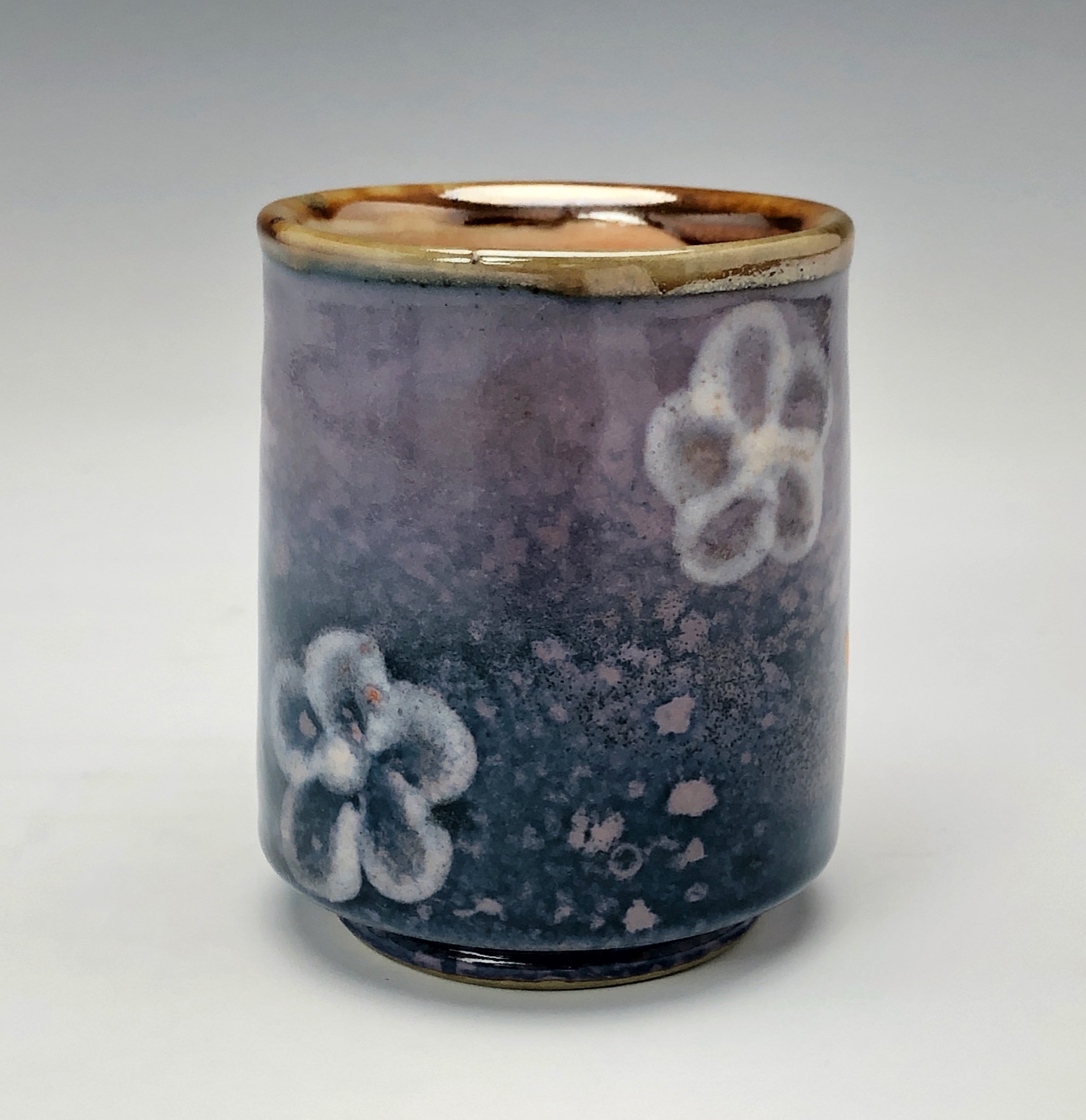  Bruce Gholson, Bulldog Pottery, Seagrove, North Carolina  Yunomi 6- Casual drinking cup made from porcelain. This cup is glazed with a lavender blue shino with a drawn fish in orange over glaze. 