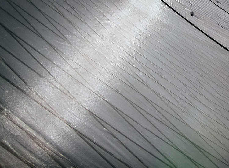 Grey taffeta over carbon tapes