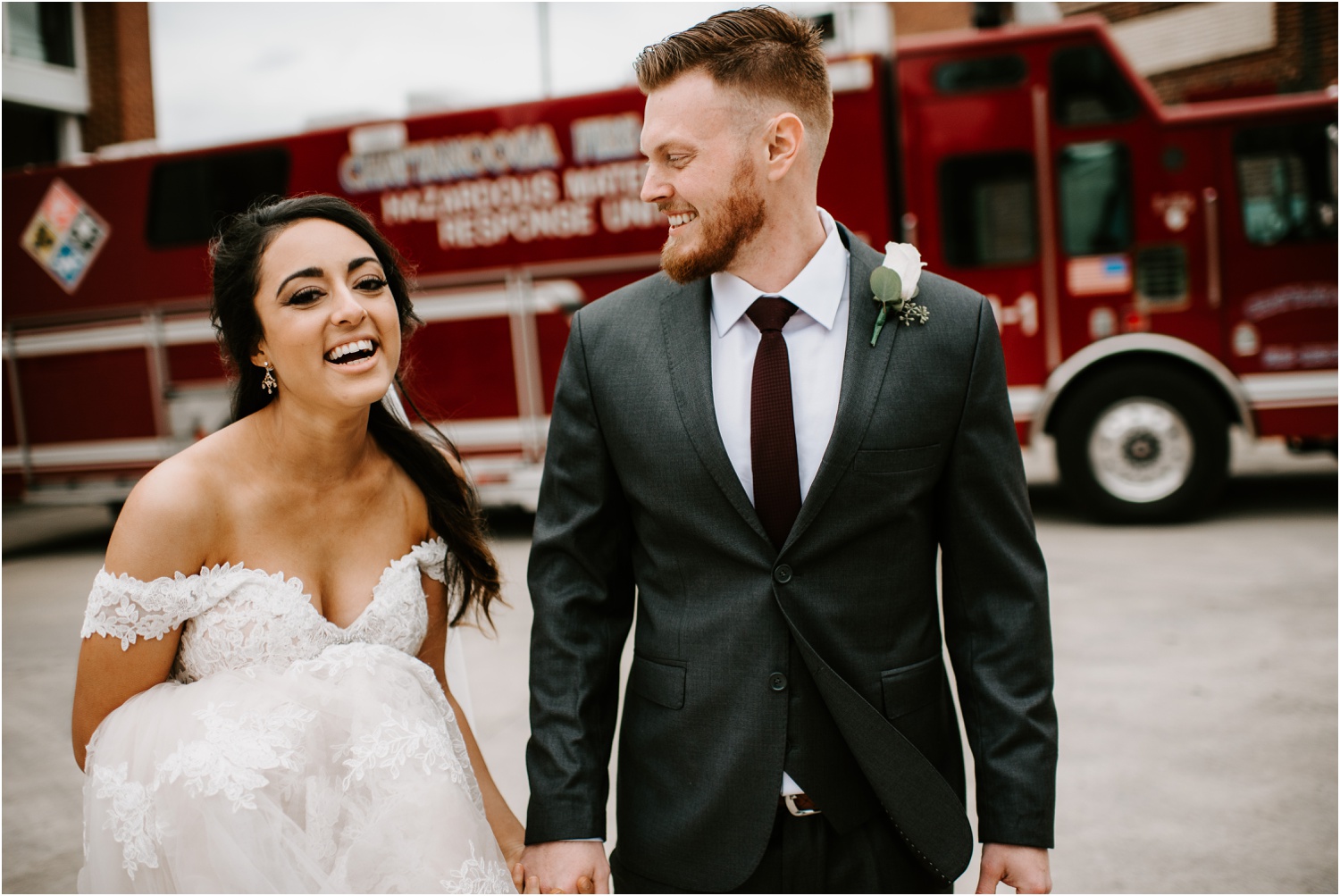 candid bride and groom laughing
