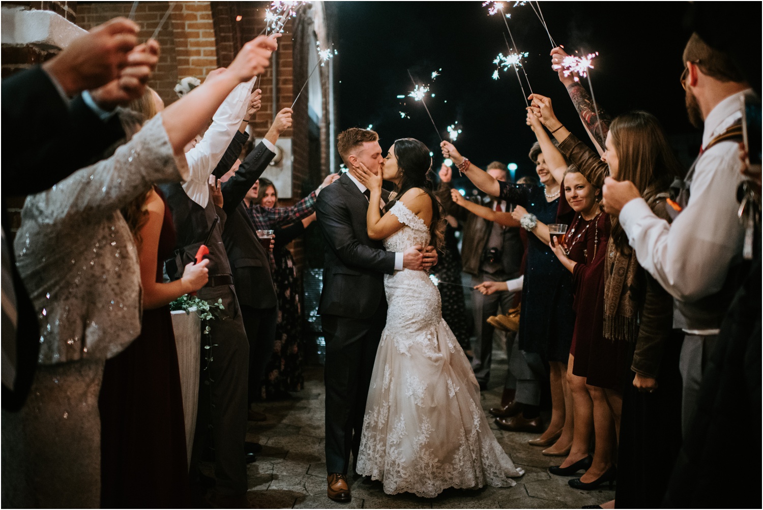 sparkler exit bride and groom kissing