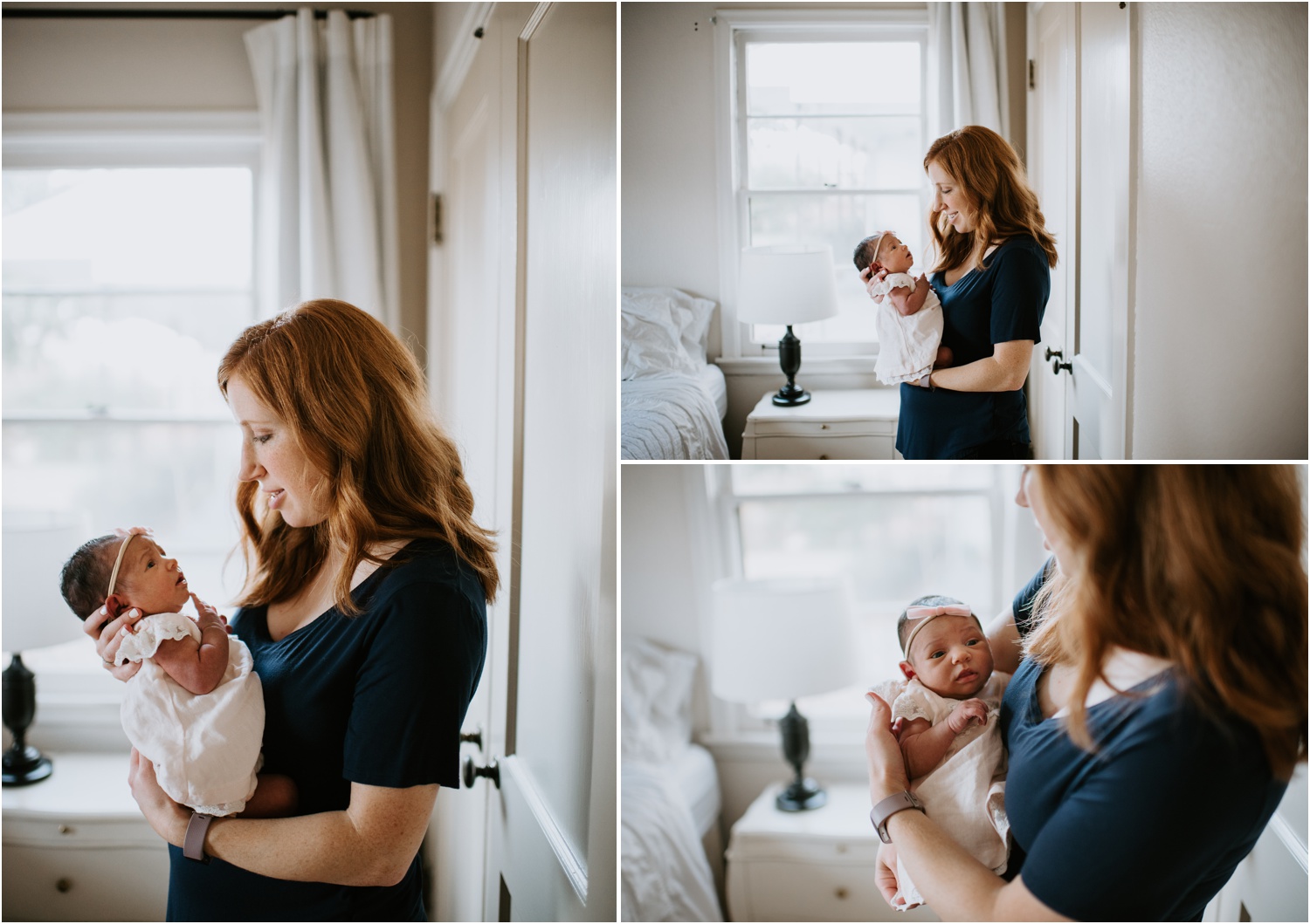 mom holding newborn by window