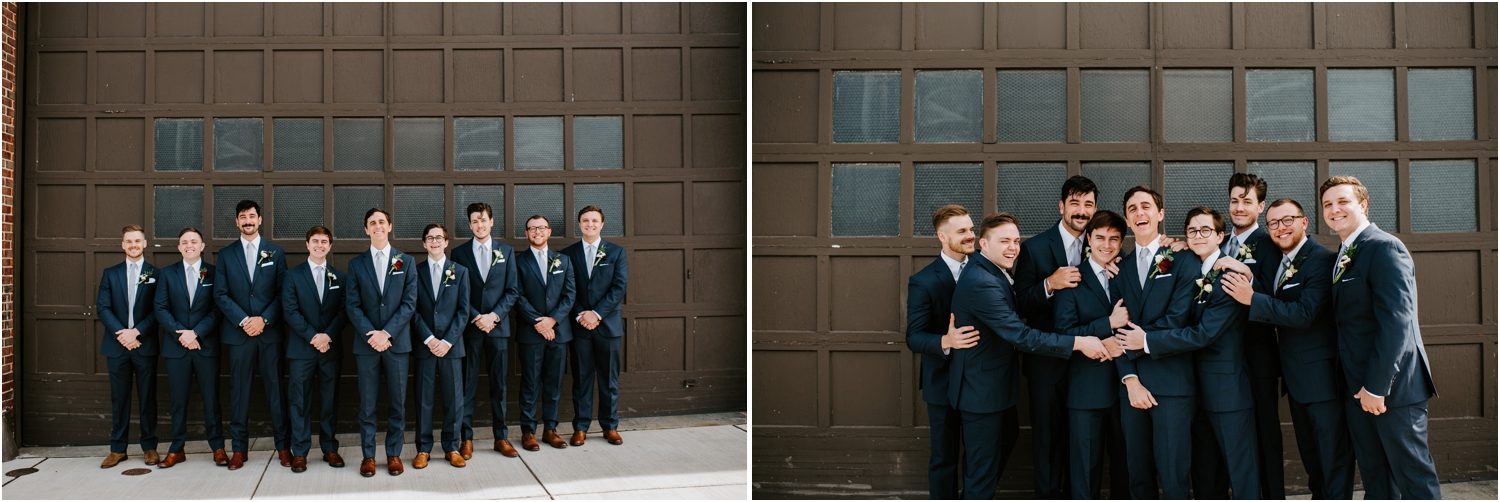 groomsmen in navy suits
