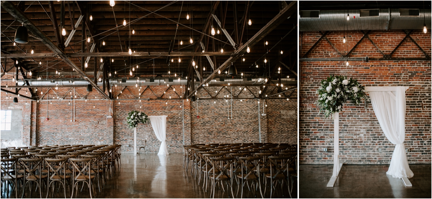 the press room knoxville white arbor with flowers and greenery