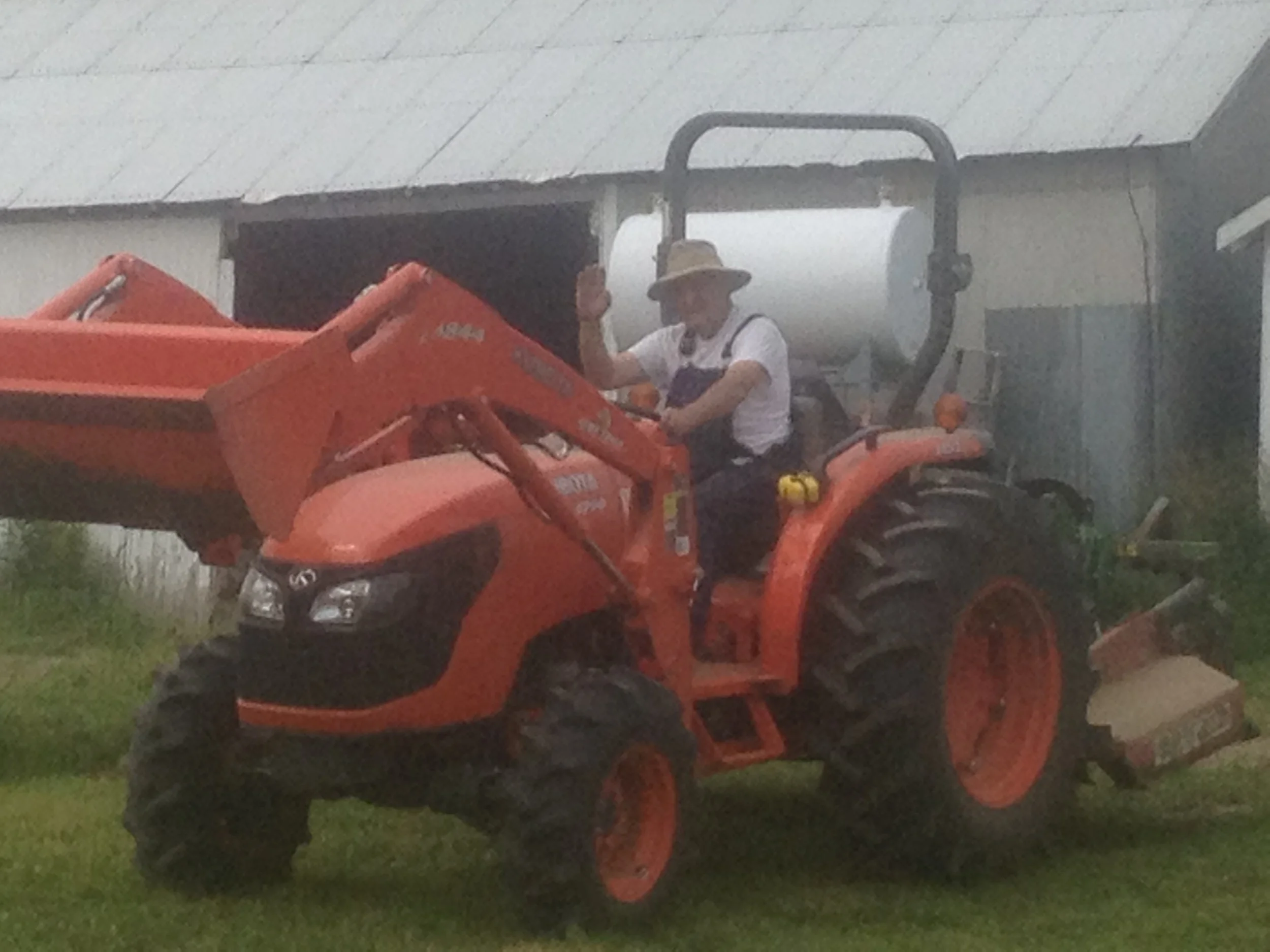Gramps on the tractor