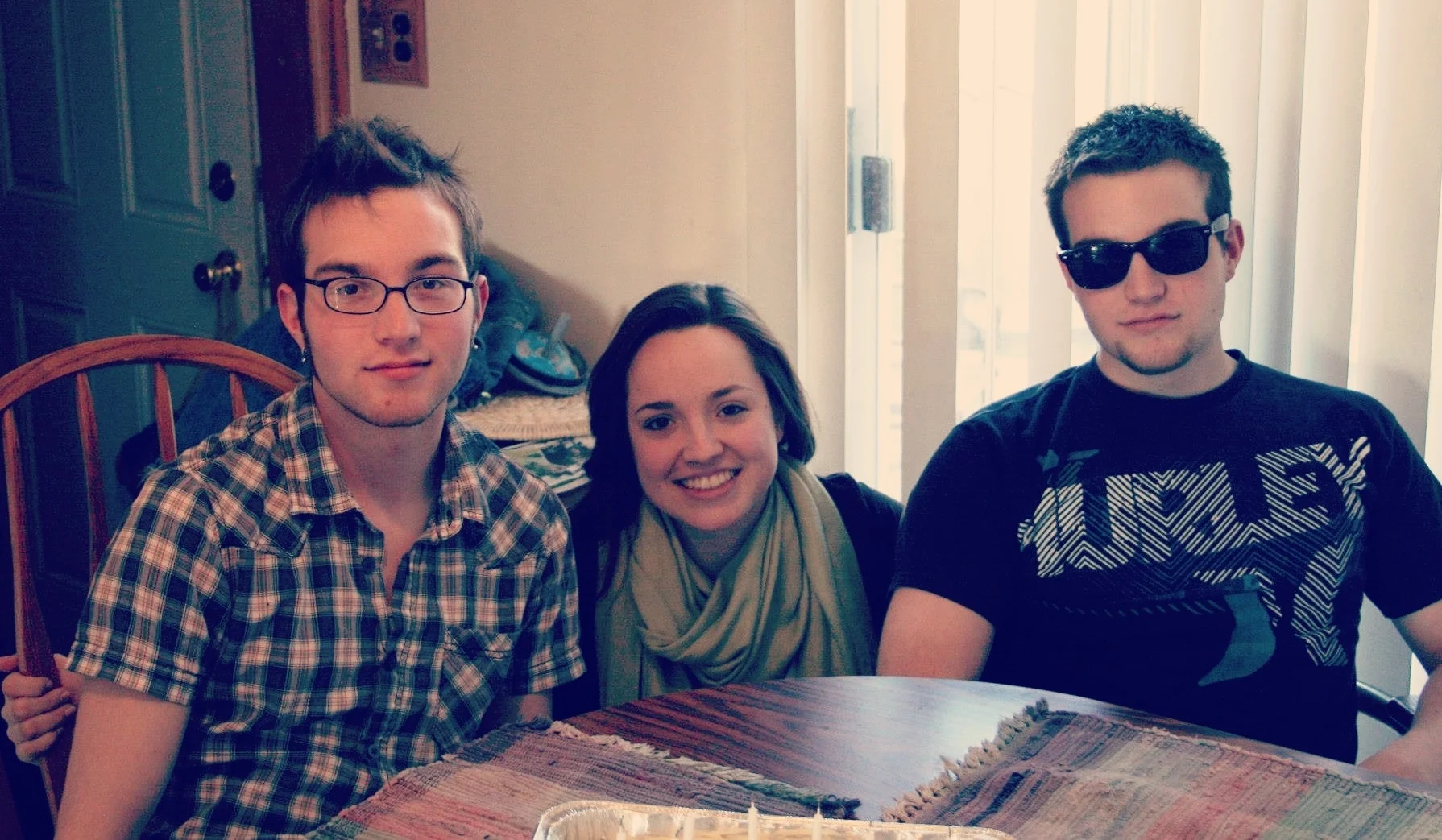 ME (center) as a college student, pictured WITH MY brothers.