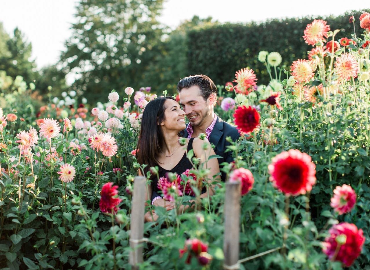 Rhett &amp; Ruwani&mdash;laughing together in a field of zinnias on a summer evening. Quite potentially what dreams are made of. ✨👌🏻 #carolineruthphotography