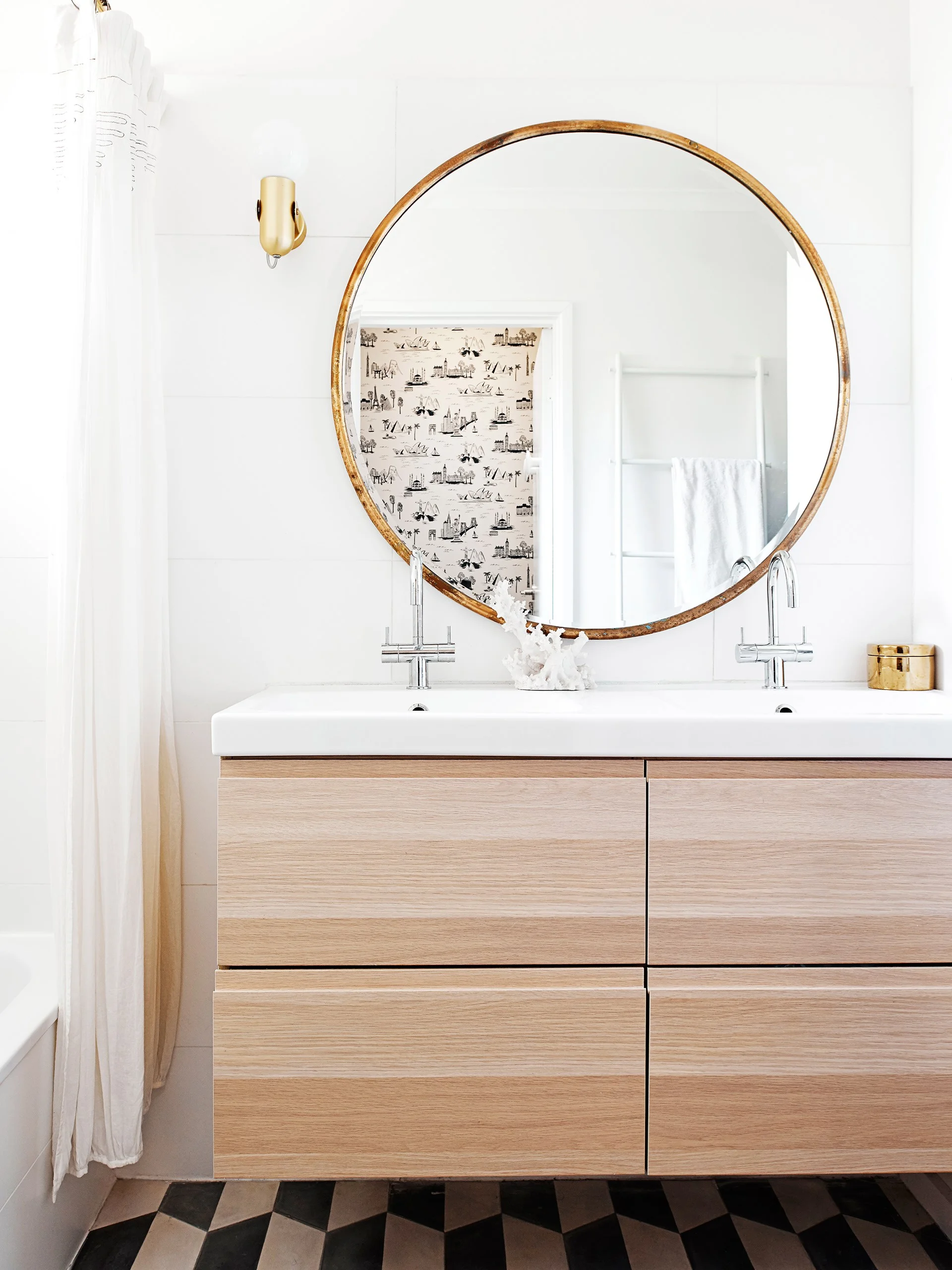 Tired of waiting for your partner to finish using the bathroom? Try a double vanity for a super stylish and practical solution.